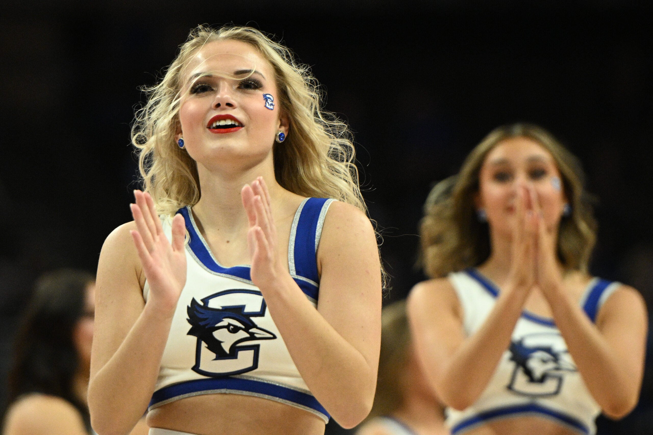 Nov 16, 2024; Omaha, Nebraska, USA;  Cheerleaders for the Creighton Bluejays perform during the second half against the UMKC Kangaroos at CHI Health Center Omaha. Mandatory Credit: Steven Branscombe-Imagn Images