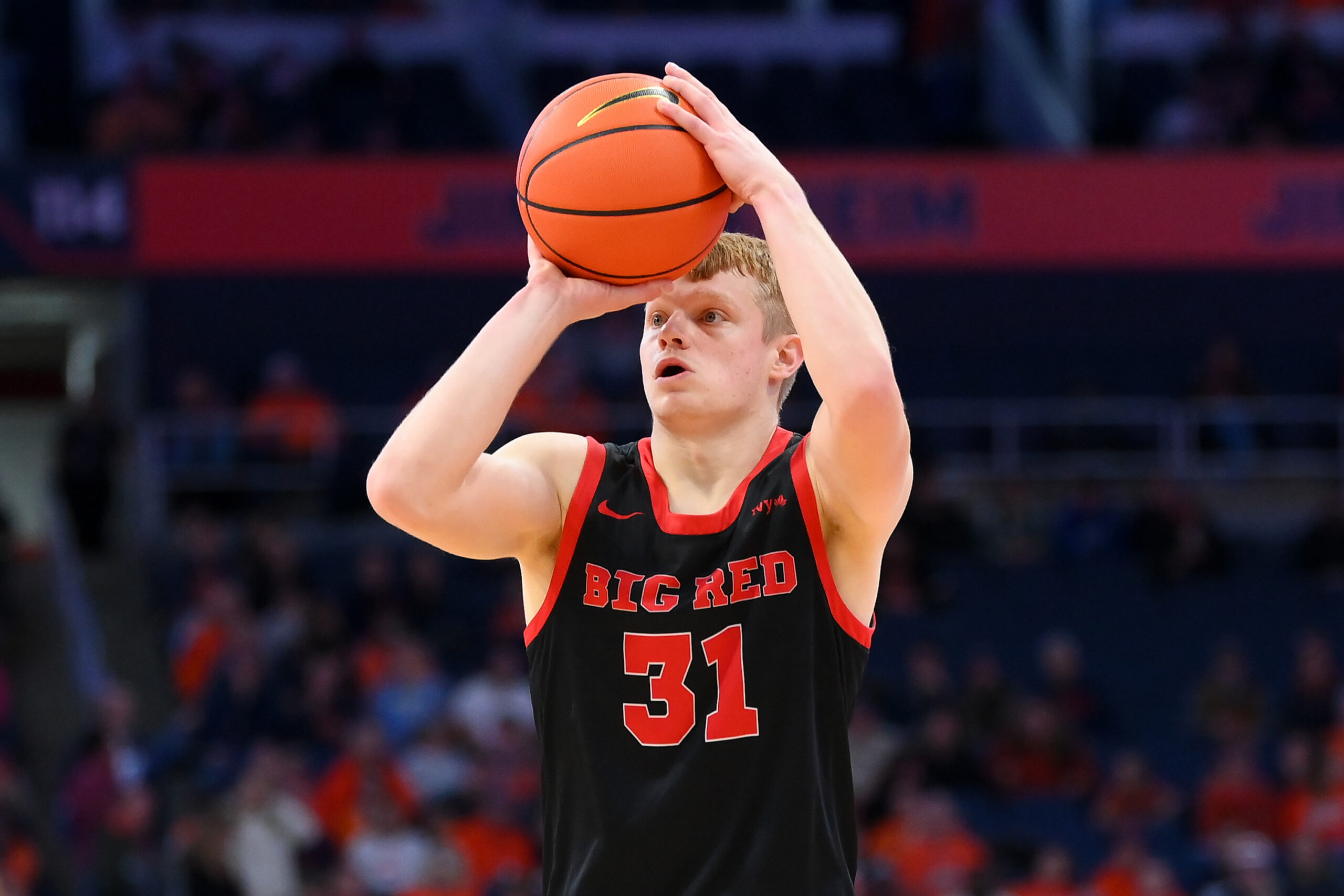 Nov 27, 2024; Syracuse, New York, USA; Cornell Big Red guard Cooper Noard (31) shoots the ball against the Syracuse Orange during the first half at the JMA Wireless Dome. Mandatory Credit: Rich Barnes-Imagn Images