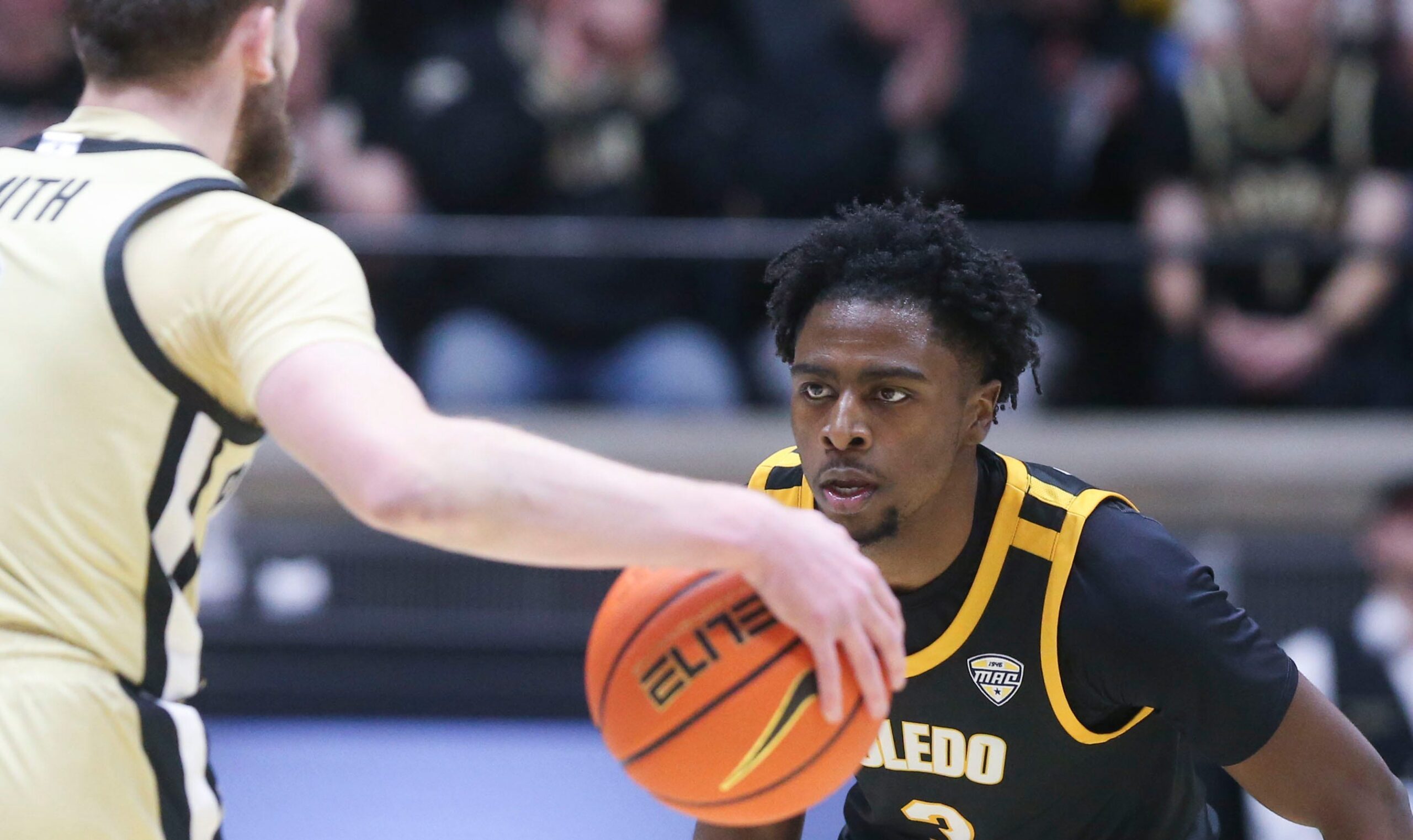 Toledo Rockets guard Sonny Wilson (3) defends Purdue Boilermakers guard Braden Smith (3) Sunday, Dec. 29, 2024, during the NCAA men’s basketball game at Mackey Arena in West Lafayette, Ind.