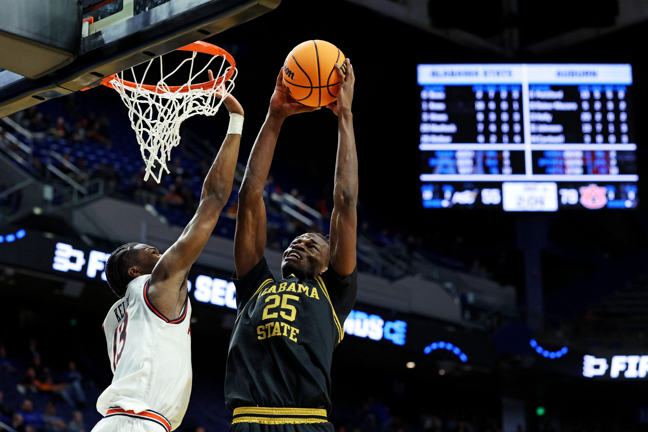 Mar 20, 2025; Lexington, KY, USA;  Alabama State Hornets forward Jasteven Walker (25) shoots the ball against Auburn Tigers guard Miles Kelly (13) during the second half in the first round of the NCAA Tournament at Rupp Arena. Mandatory Credit: Jordan Prather-Imagn Images