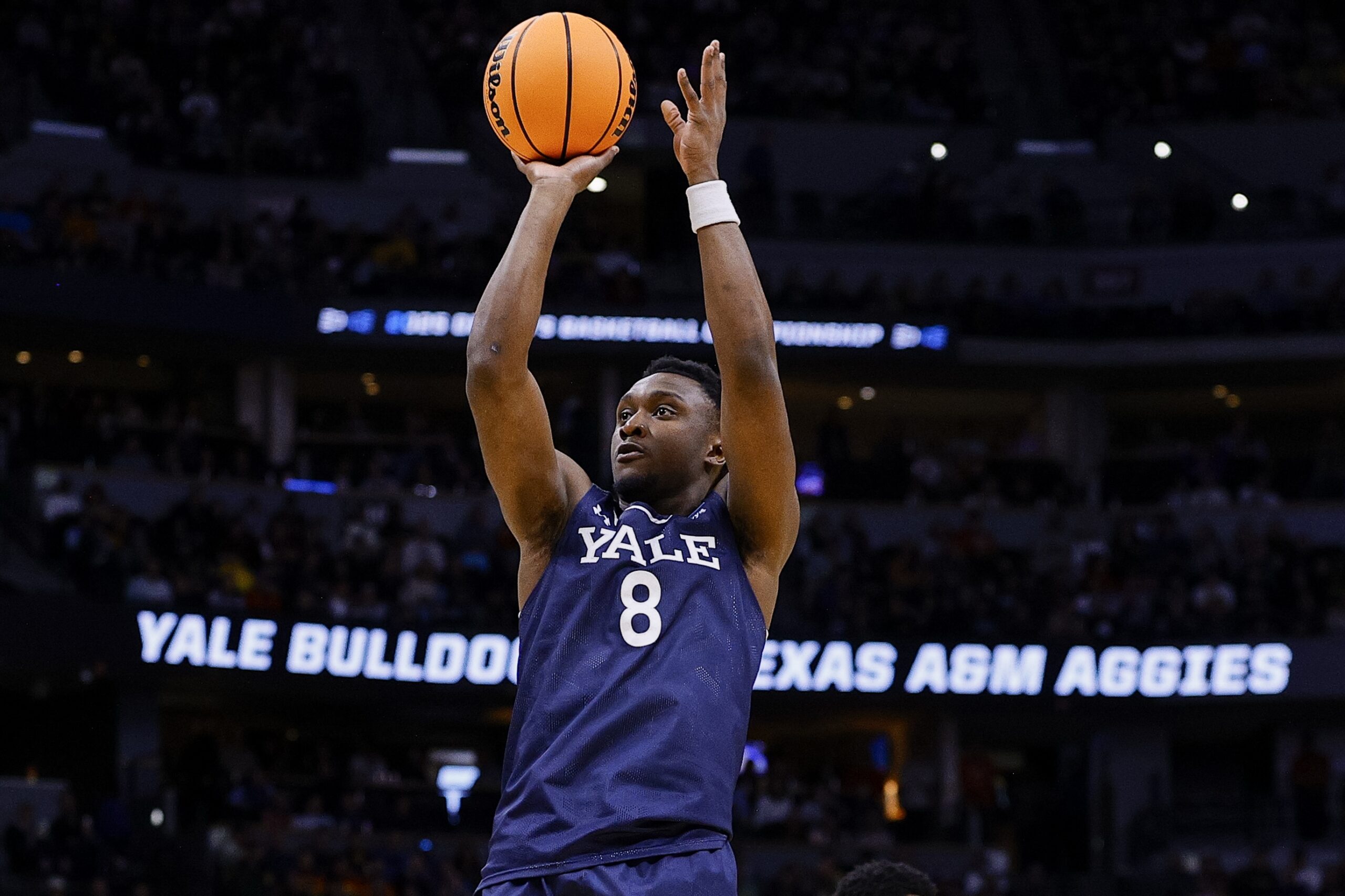 March 20, 2025; Denver, CO, USA; Yale Bulldogs forward Nick Townsend (42) attempts to shoot the ball against the Texas A&M Aggies at Ball Arena. Mandatory Credit: Isaiah J. Downing-Imagn Images