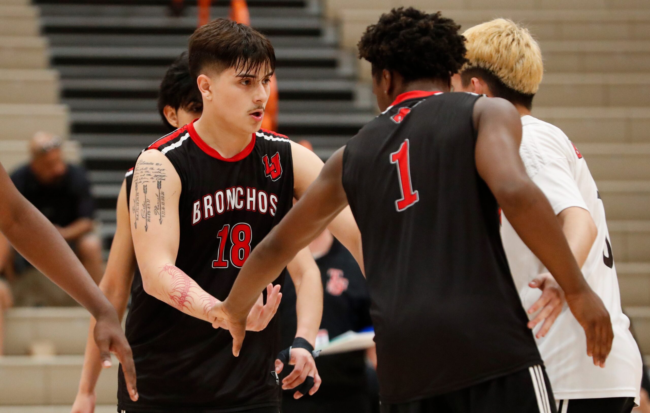 Lafayette Jeff Bronchos Colin Smith (18) celebrates with teammates Thursday, May 15, 2025, during the IHSAA boys volleyball sectionals match against the Zionsville Eagles at Harrison High School in West Lafayette, Indiana.