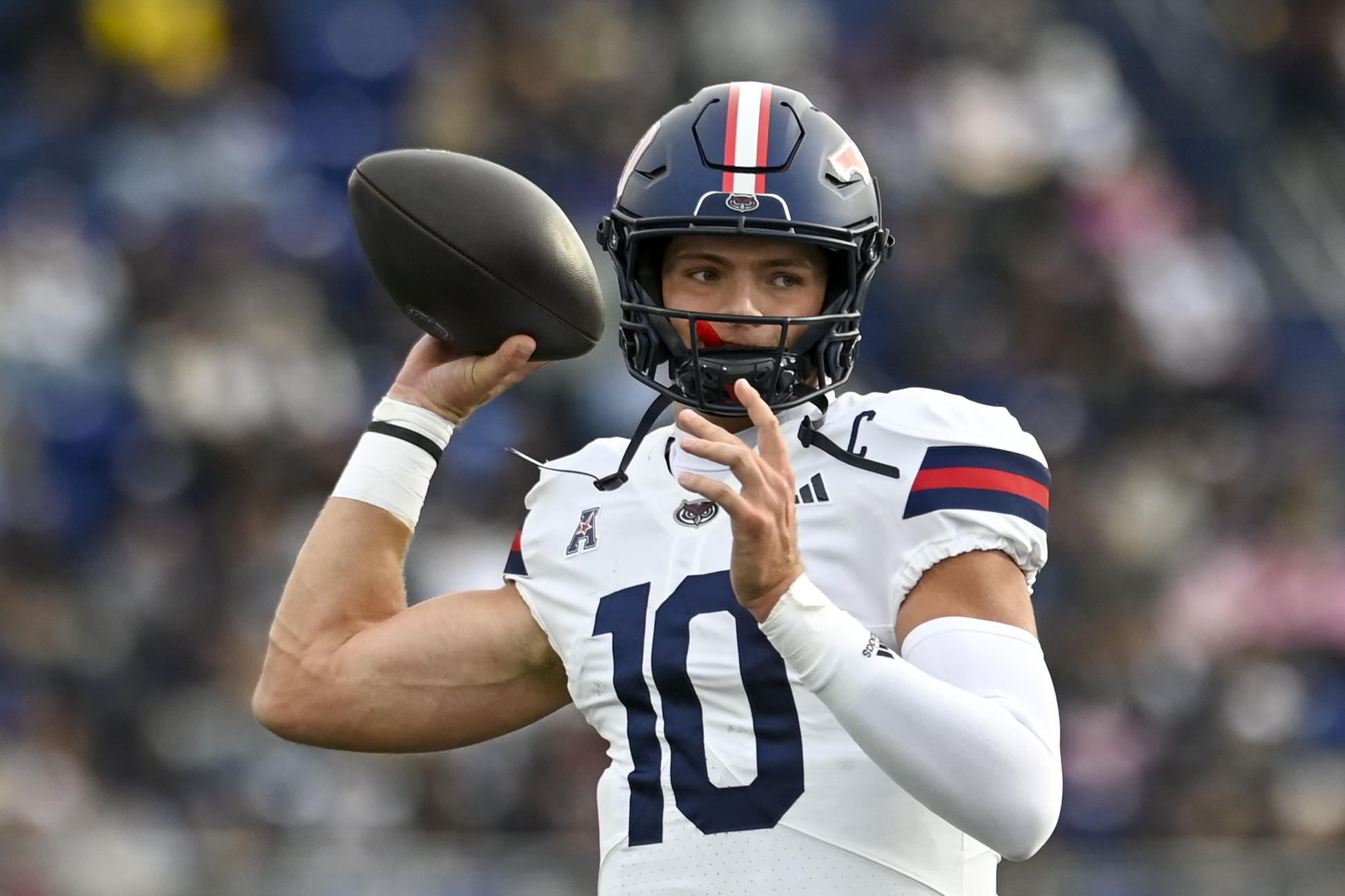 Oct 25, 2025; Annapolis, Maryland, USA;  Florida Atlantic Owls quarterback Caden Veltkamp (10) throws during the first half against the Navy Midshipmen at Navy-Marine Corps Memorial Stadium. Mandatory Credit: Tommy Gilligan-Imagn Images