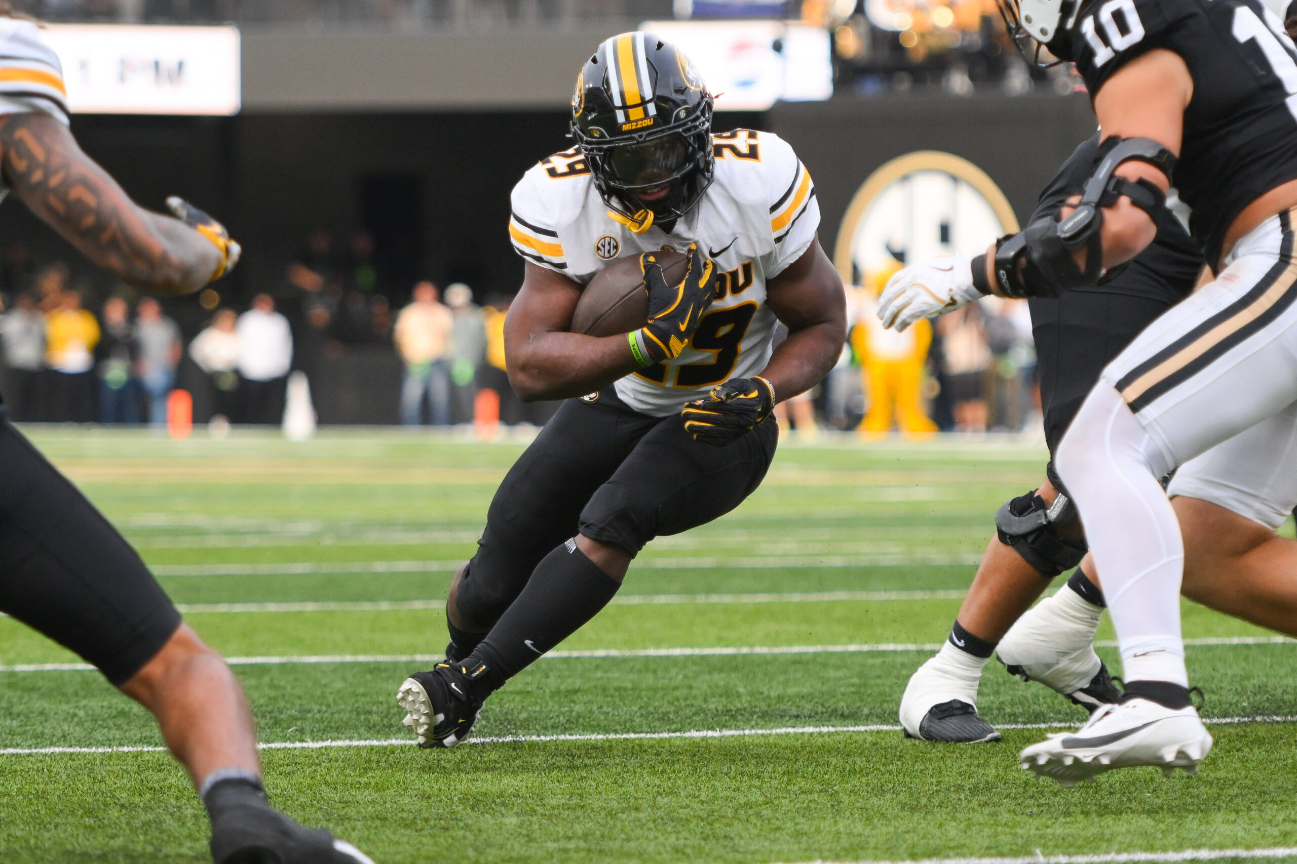 Oct 25, 2025; Nashville, Tennessee, USA;  Missouri Tigers running back Ahmad Hardy (29) runs with the ball against the Vanderbilt Commodores during the first half at FirstBank Stadium. Mandatory Credit: Steve Roberts-Imagn Images