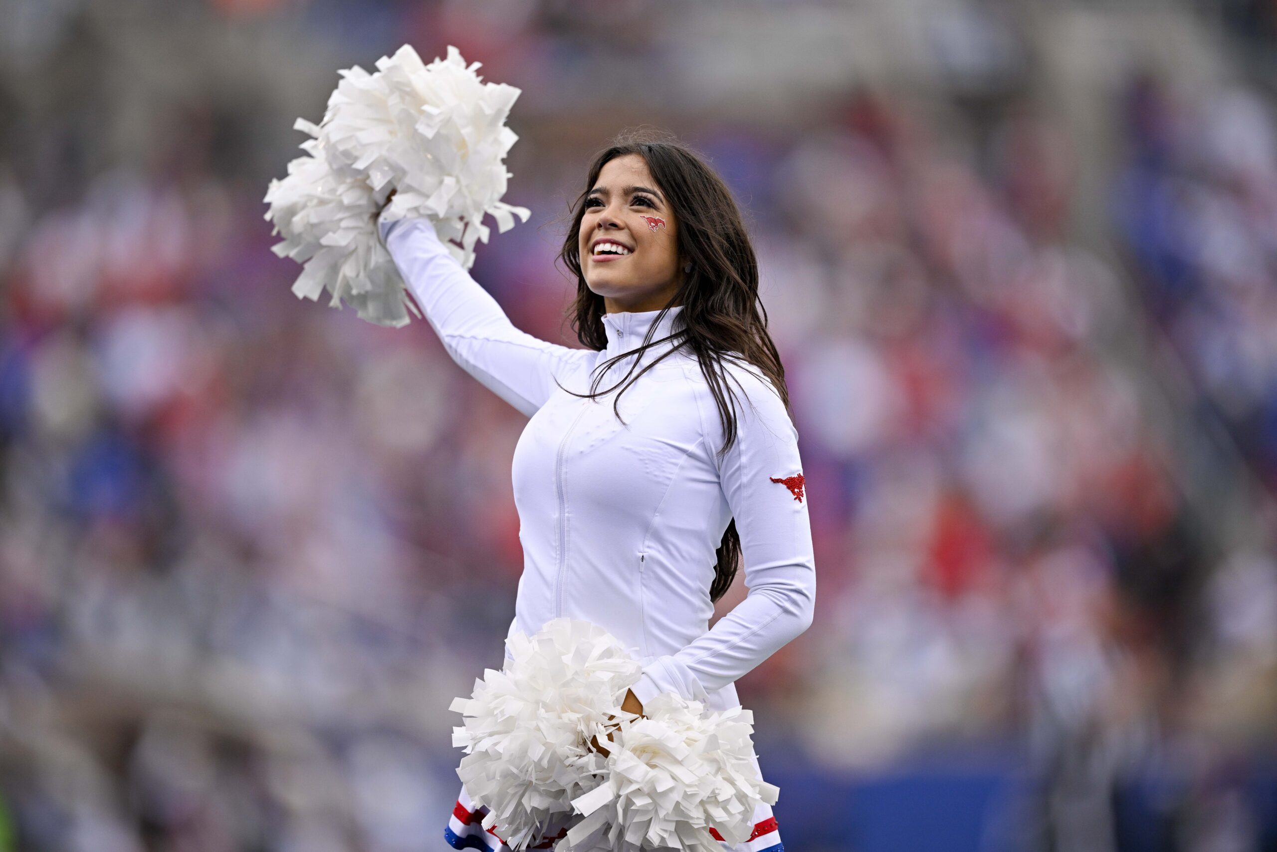 Nov 1, 2025; Dallas, Texas, USA;  The SMU Mustangs cheerleaders perform during the game against the Miami Hurricanes at Gerald J. Ford Stadium. Mandatory Credit: Jerome Miron-Imagn Images