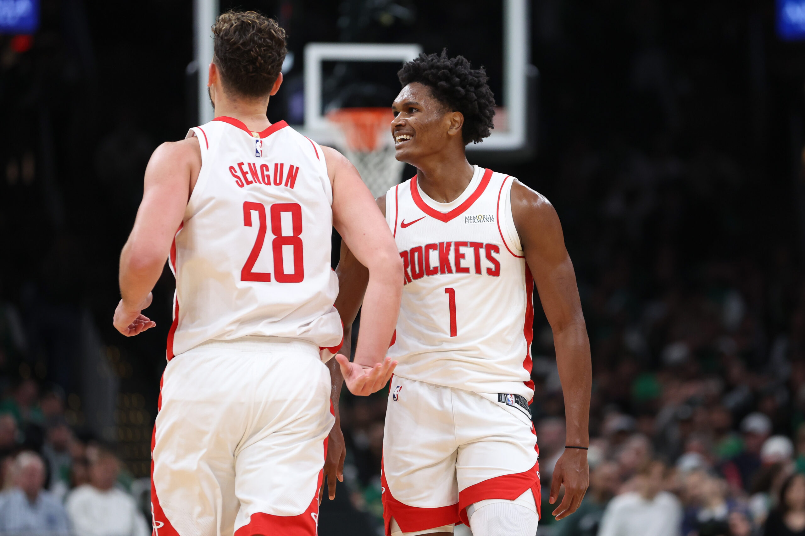 Nov 1, 2025; Boston, Massachusetts, USA; Houston Rockets forward Amen Thompson (1) and center Alperen Sengun (28) react during the second half against the Boston Celtics at TD Garden. Mandatory Credit: Paul Rutherford-Imagn Images