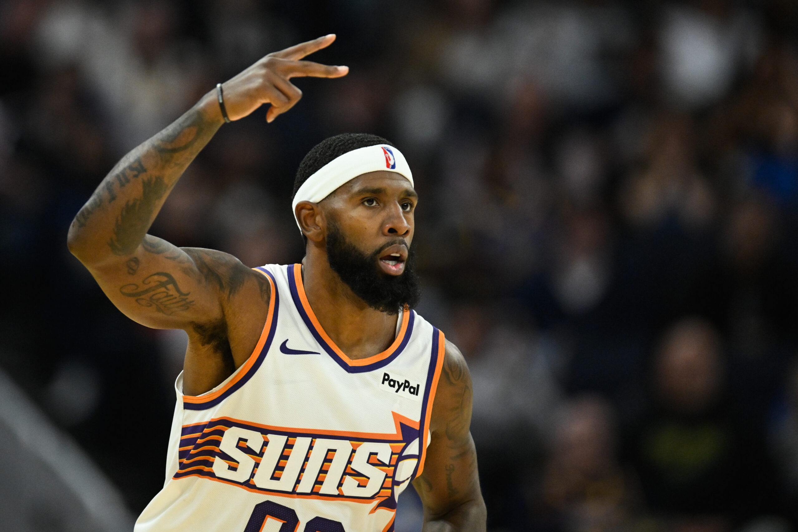 Nov 4, 2025; San Francisco, California, USA; Phoenix Suns forward Royce O'Neale (00) celebrates a three point basket against the Golden State Warriors in the third quarter at Chase Center. Mandatory Credit: Eakin Howard-Imagn Images
