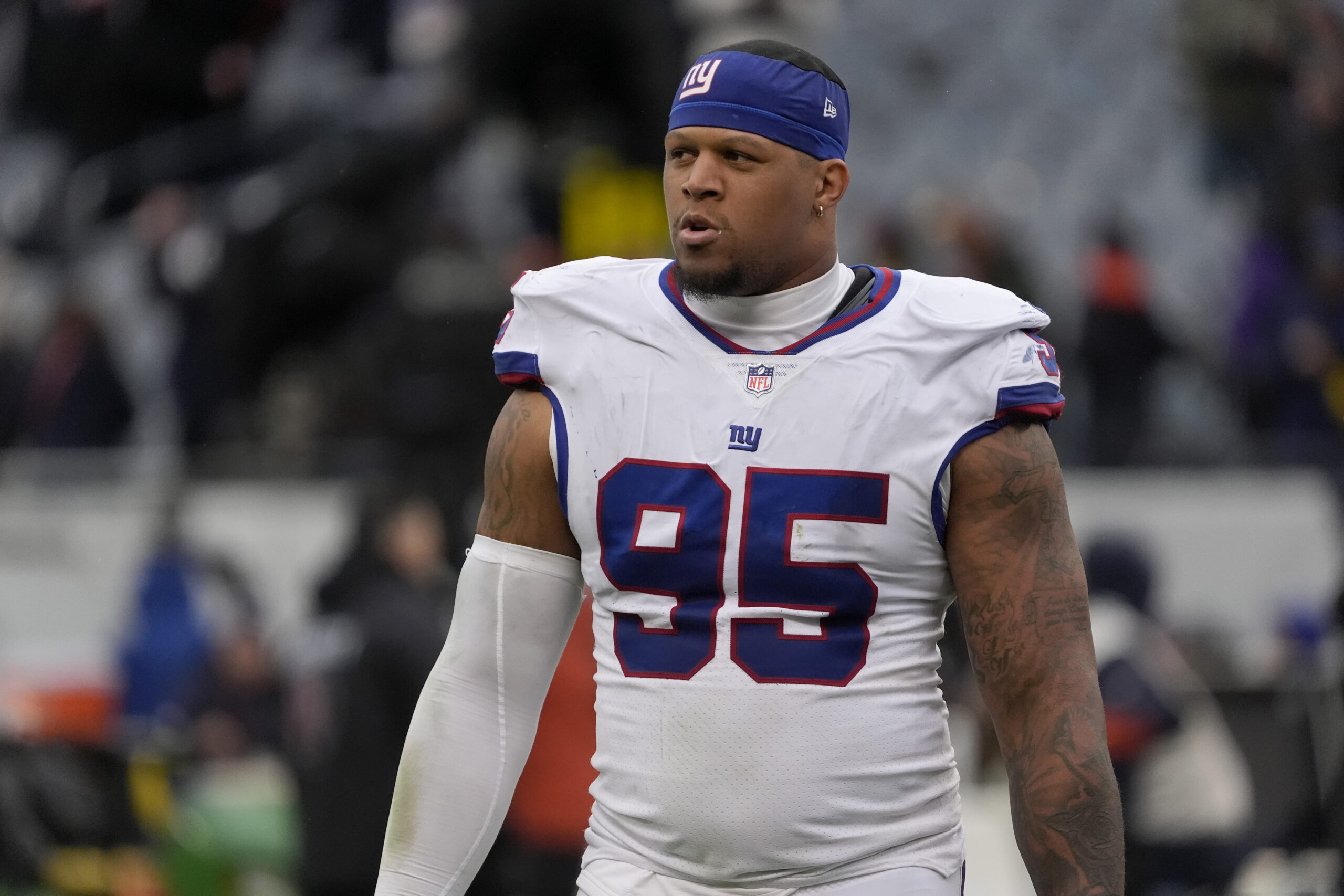 Nov 9, 2025; Chicago, Illinois, USA; New York Giants defensive tackle Roy Robertson-Harris (95) leaves the field after losing to the Chicago Bears at Soldier Field. Mandatory Credit: David Banks-Imagn Images