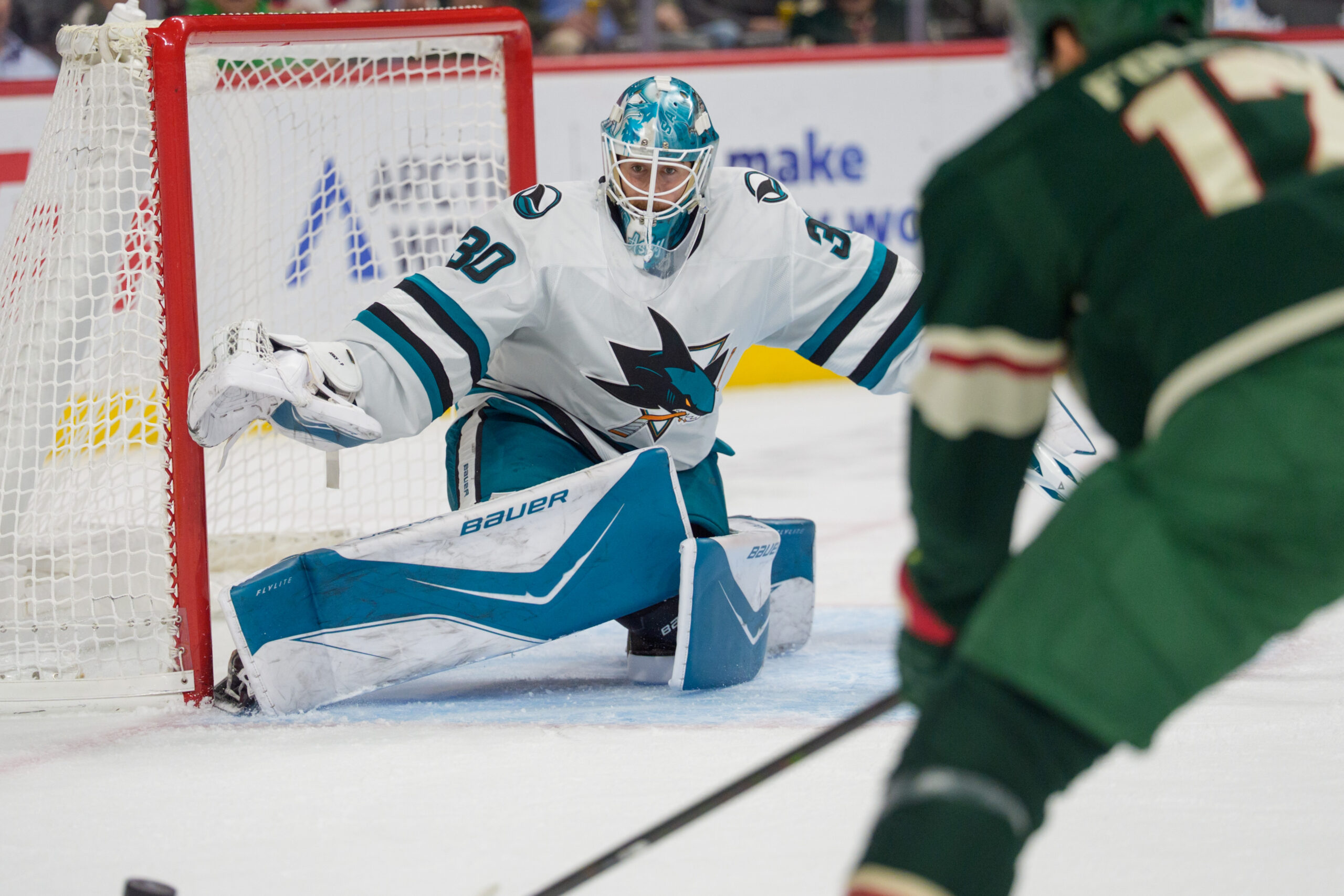 Nov 11, 2025; Saint Paul, Minnesota, USA; San Jose Sharks goaltender Yaroslav Askarov (30) prepares for a shot from Minnesota Wild left wing Marcus Foligno (17) in the second period at Grand Casino Arena. Mandatory Credit: Matt Blewett-Imagn Images
