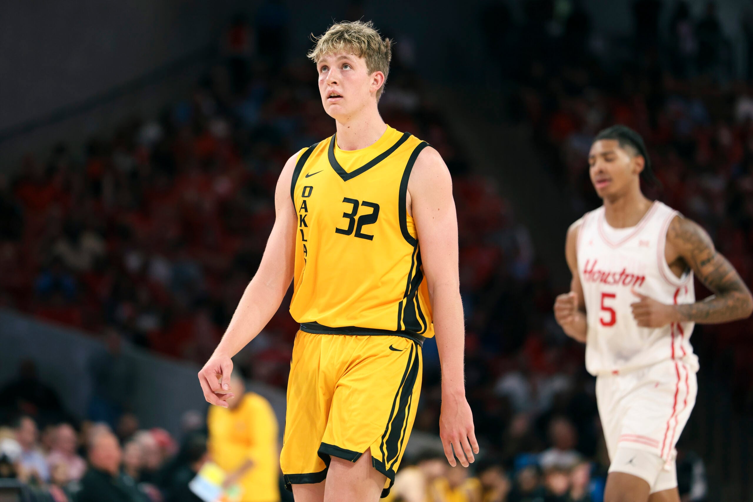 Nov 12, 2025; Houston, Texas, USA; Oakland Golden Grizzlies forward Isaac Garrett (32) reacts after a play during the second half against the Houston Cougars at Fertitta Center. Mandatory Credit: Troy Taormina-Imagn Images