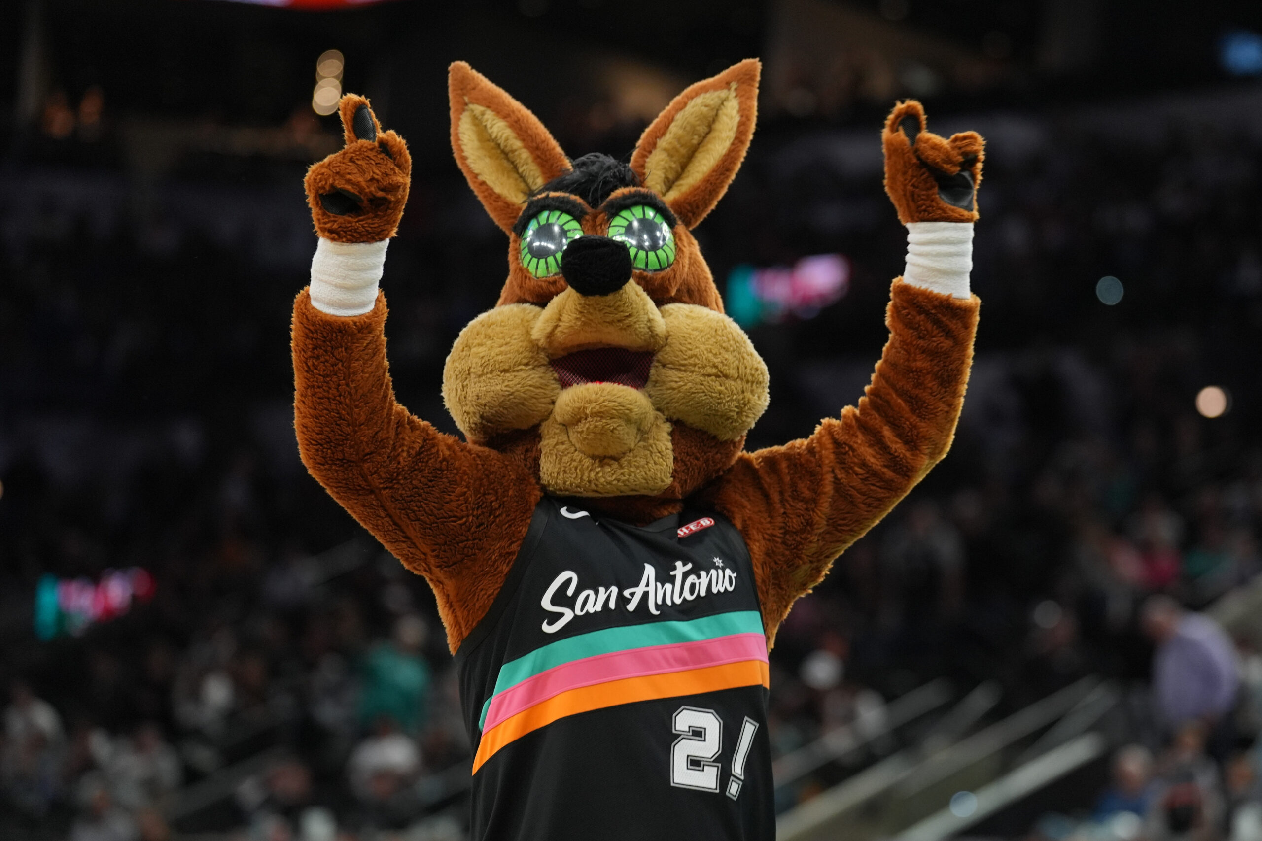 Nov 12, 2025; San Antonio, Texas, USA;  The San Antonio Spurs Coyote performs in the second half against the Golden State Warriors at Frost Bank Center. Mandatory Credit: Daniel Dunn-Imagn Images