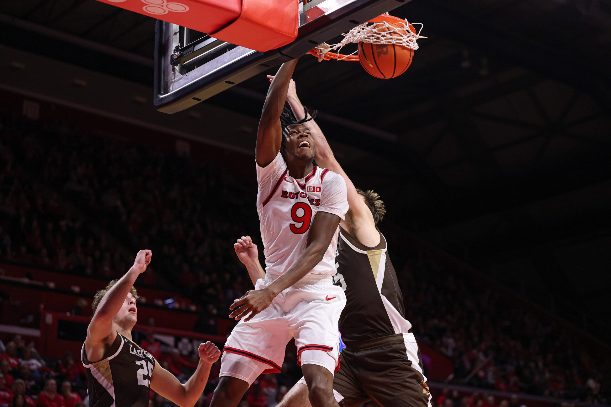Nov 14, 2025; Piscataway, New Jersey, USA; Rutgers Scarlet Knights forward Dylan Grant (9) dunks the ball during the second half against the Lehigh Mountain Hawks at Jersey Mike's Arena. Mandatory Credit: Vincent Carchietta-Imagn Images