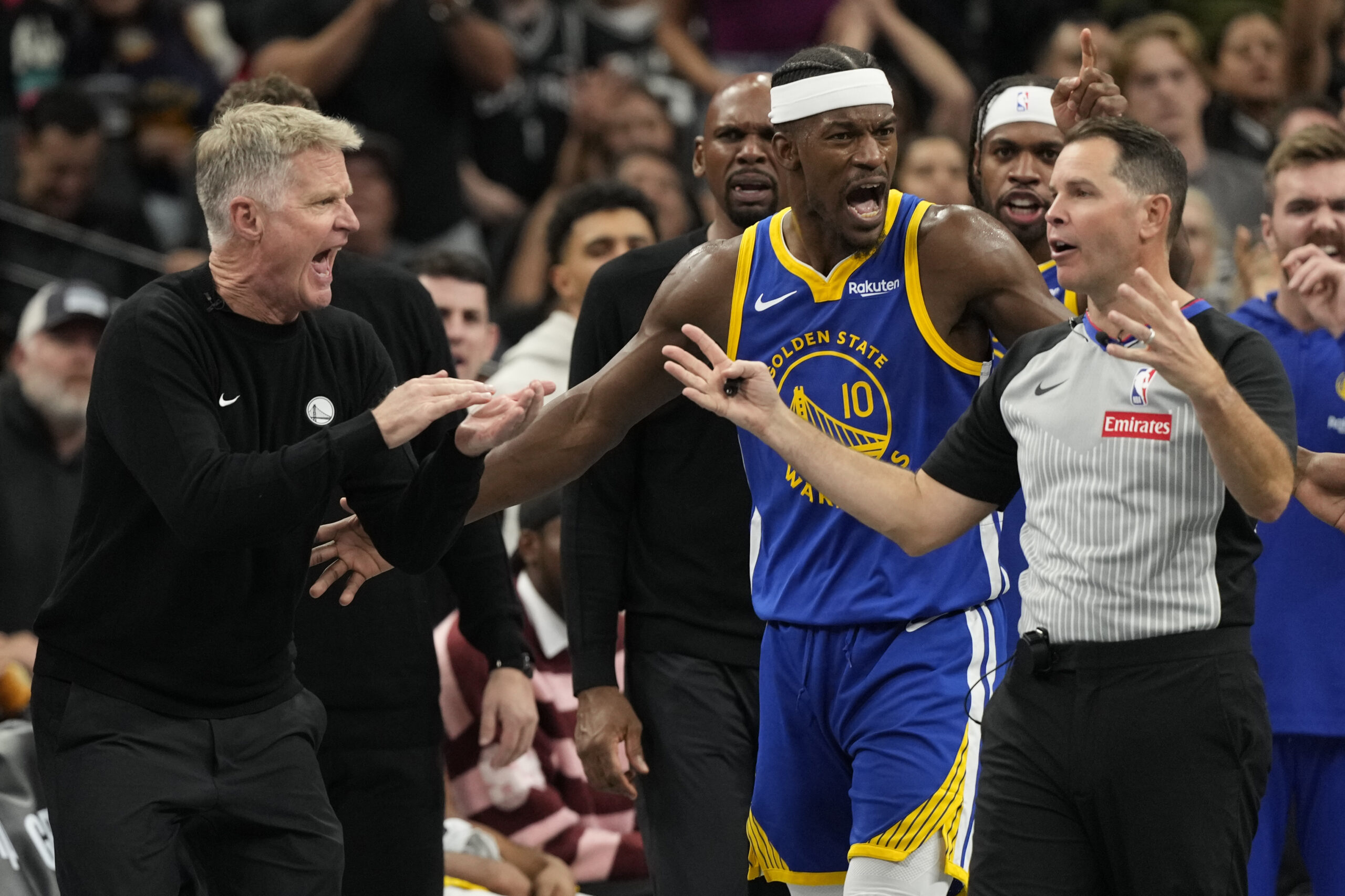 Nov 14, 2025; San Antonio, Texas, USA; Golden State Warriors Head Coach Steve Kerr and forward Jimmy Butler (10) argue with official Brian Forte (45) during the second half at Frost Bank Center. Mandatory Credit: Scott Wachter-Imagn Images