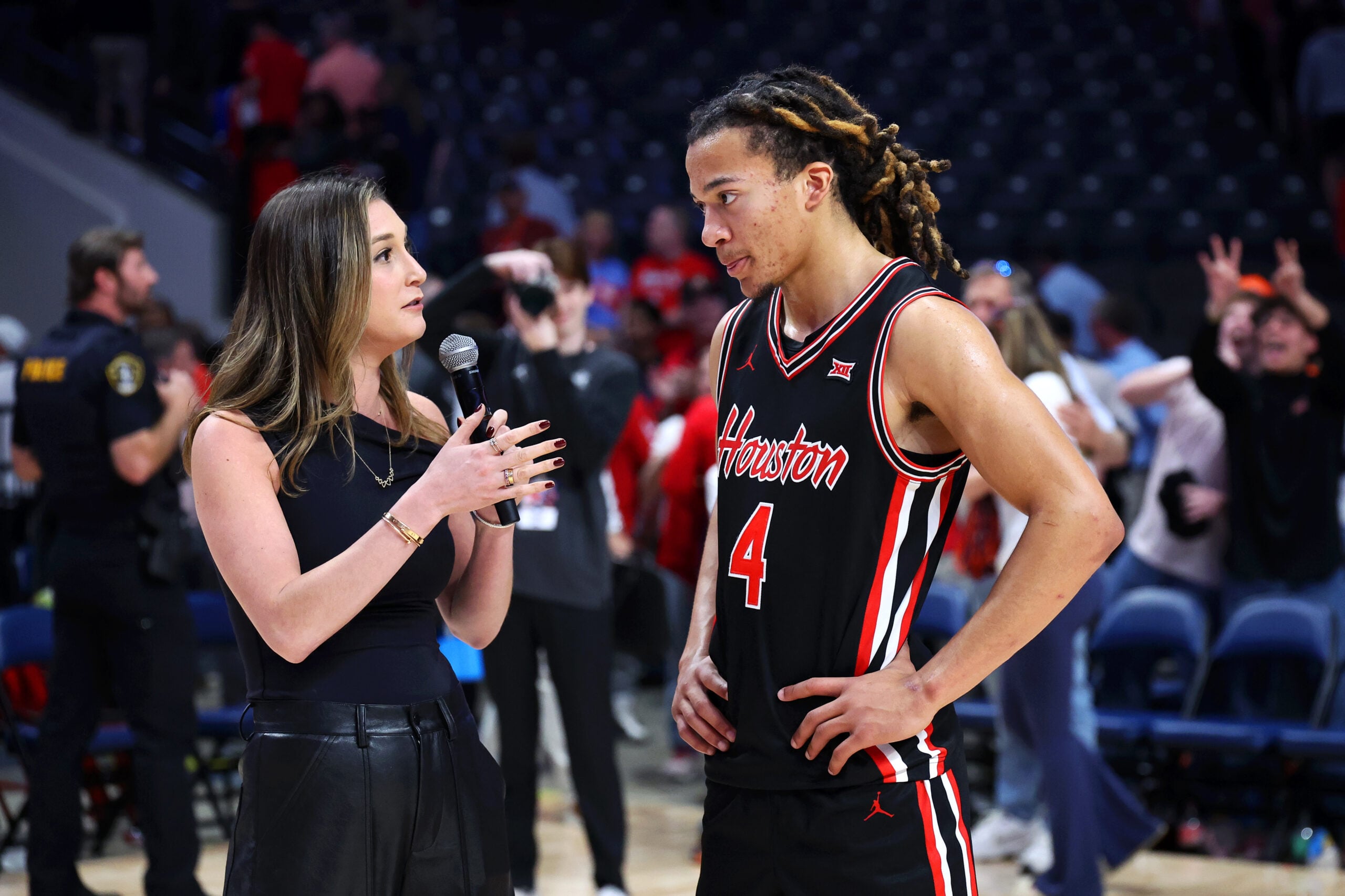 Nov 16, 2025; Birmingham, Alabama, USA; Houston Cougars guard Kingston Flemings (4) is interviewed after their victory against the Auburn Tigers at Legacy Arena at BJCC. Mandatory Credit: David Leong-Imagn Images