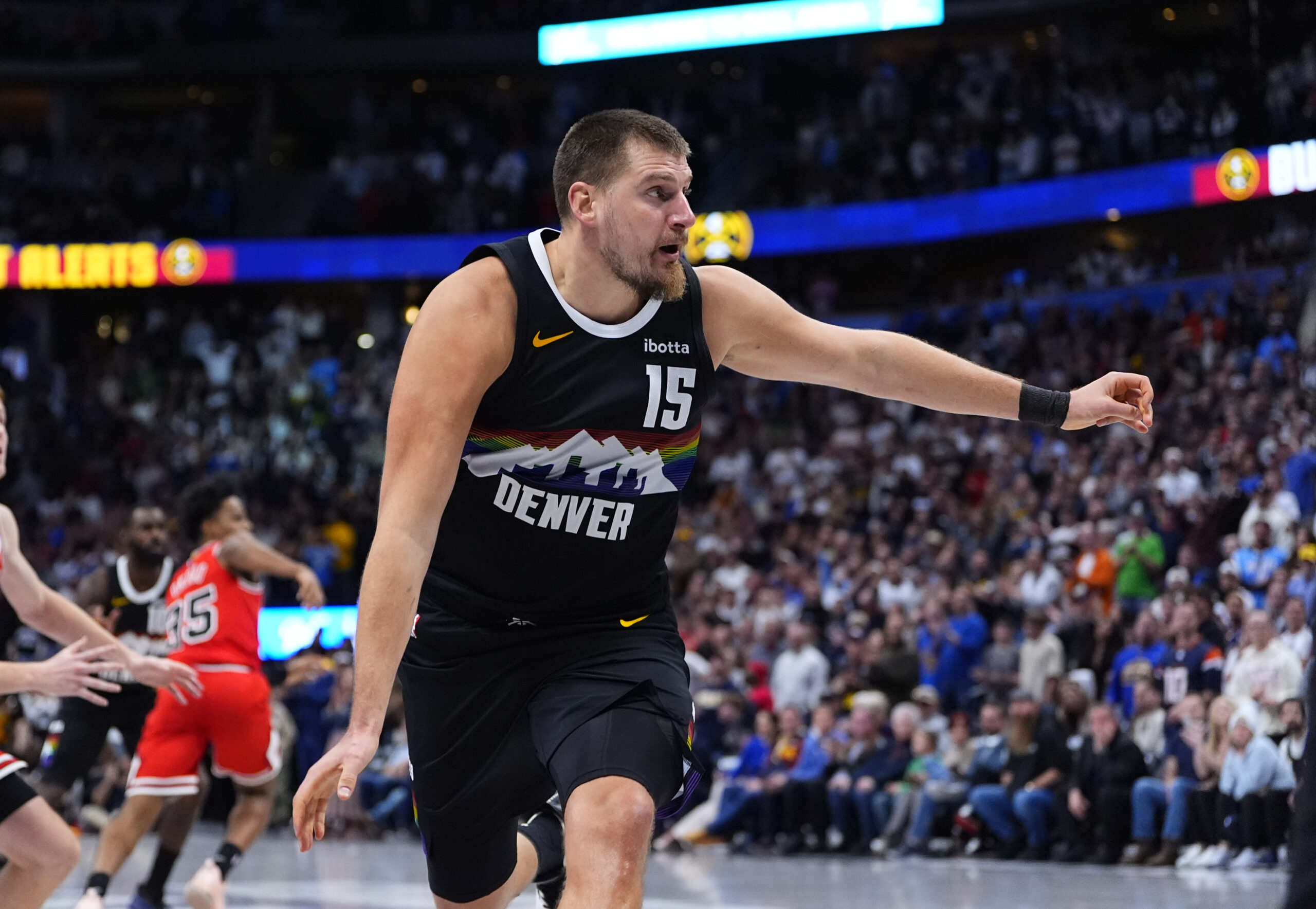 Nov 17, 2025; Denver, Colorado, USA; Denver Nuggets center Nikola Jokic (15) during the fourth quarter against the Chicago Bulls at Ball Arena. Mandatory Credit: Ron Chenoy-Imagn Images