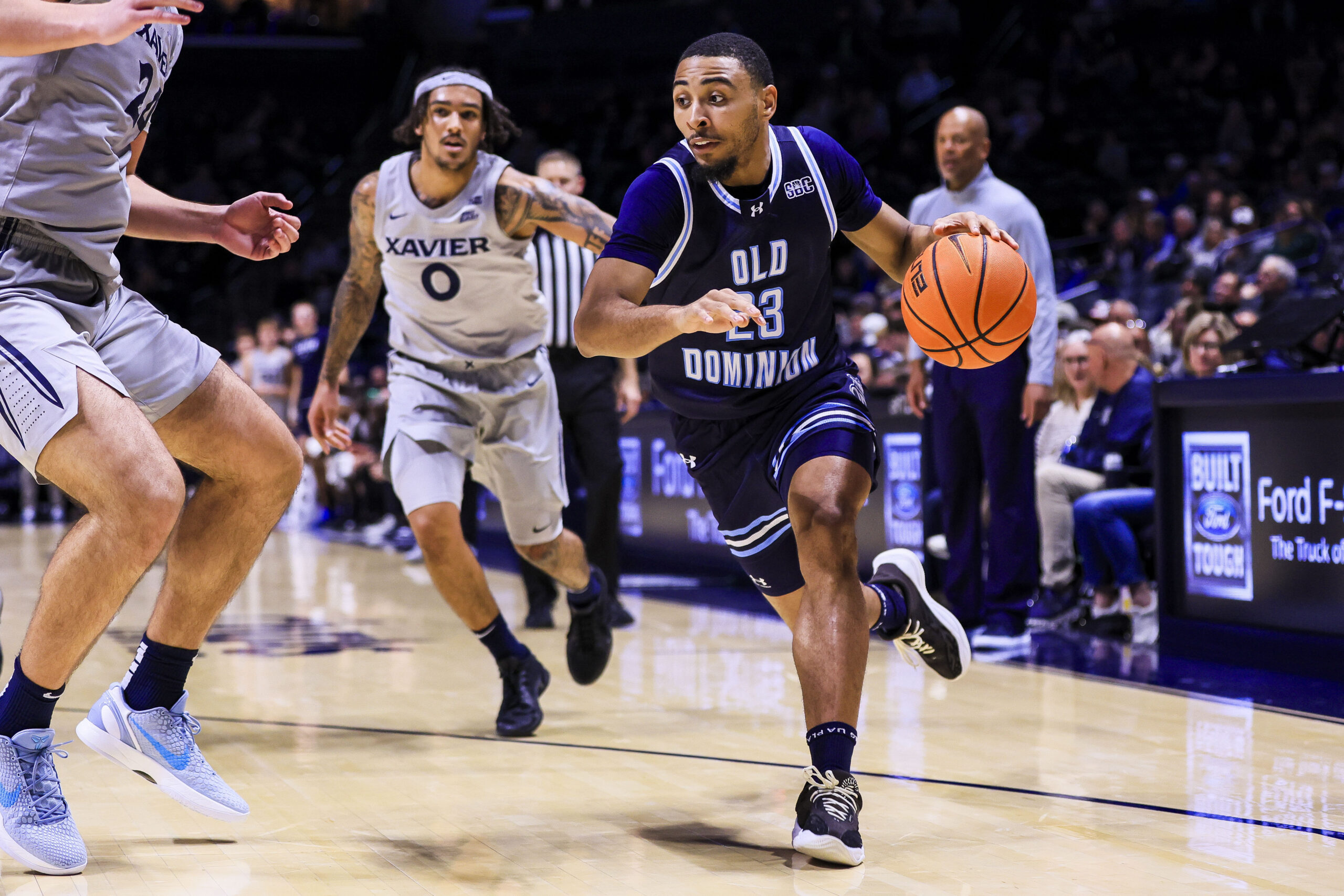 Nov 18, 2025; Cincinnati, Ohio, USA; Old Dominion Monarchs guard Jordan Battle (23) dribbles against the Xavier Musketeers in the second half at Cintas Center. Mandatory Credit: Katie Stratman-Imagn Images