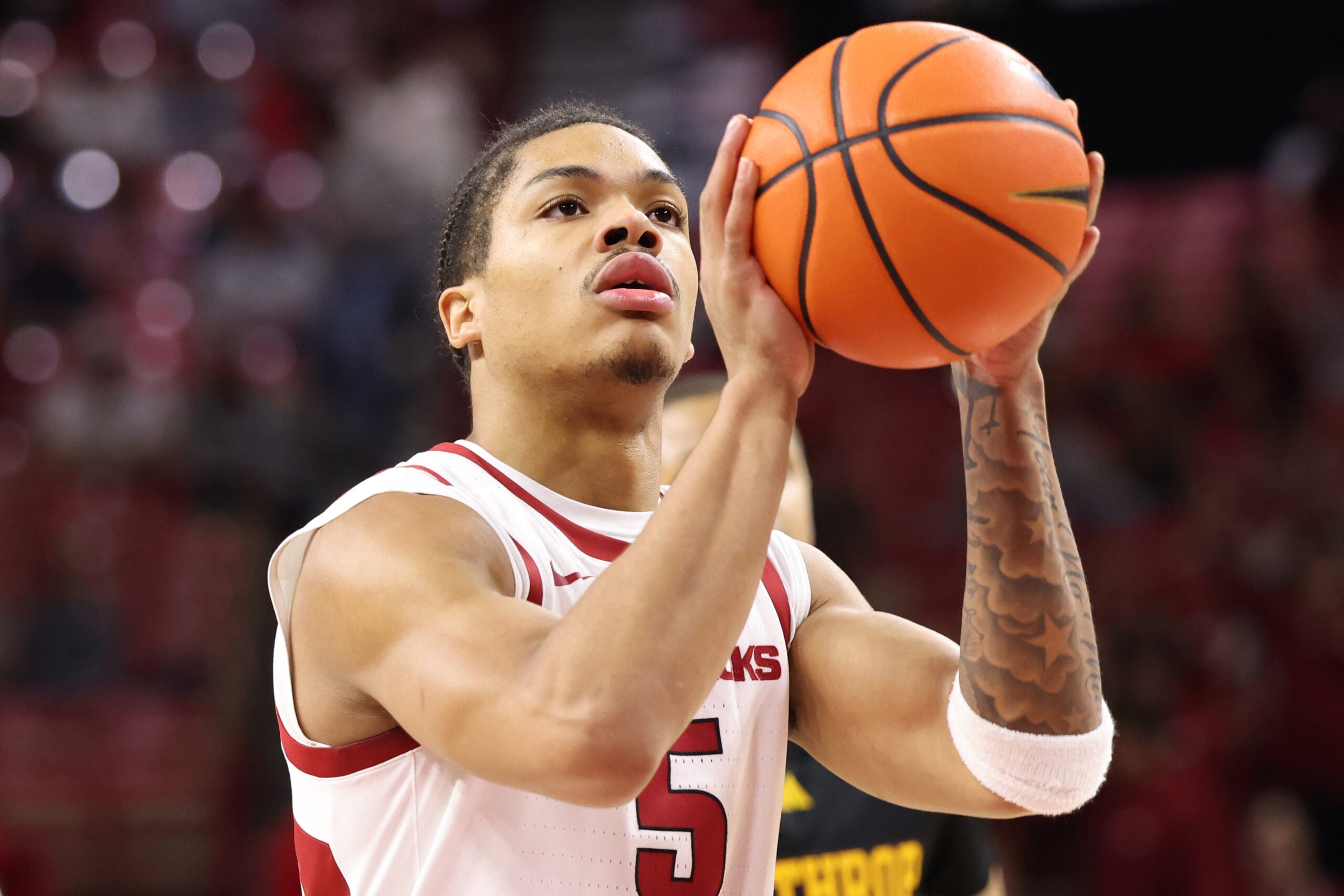 Nov 18, 2025; Fayetteville, Arkansas, USA; Arkansas Razorbacks guard Darius Acuff Jr (5) shoots a free throw against the Winthrop Eagles during the first half at Bud Walton Arena. Arkansas won 84-83. Mandatory Credit: Nelson Chenault-Imagn Images