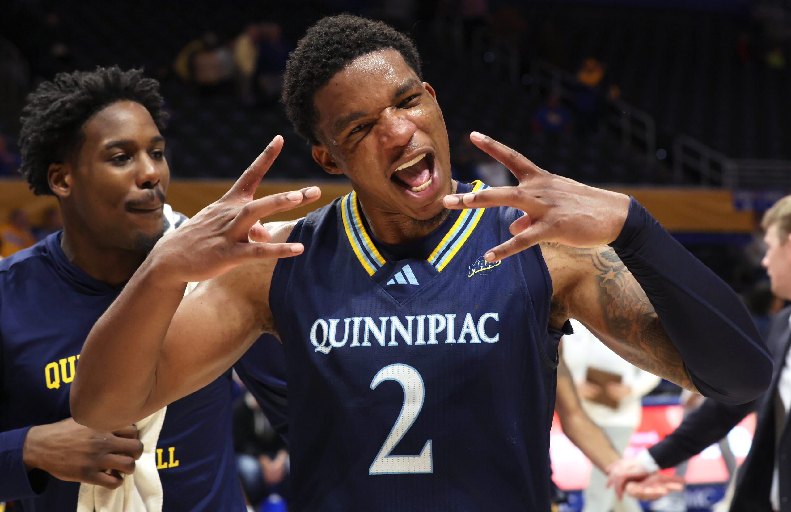 Nov 23, 2025; Pittsburgh, Pennsylvania, USA; Quinnipiac Bobcats forward Amarri Monroe (2) celebrates after defeating the Pittsburgh Panthers at the Petersen Events Center. Mandatory Credit: Charles LeClaire-Imagn Images