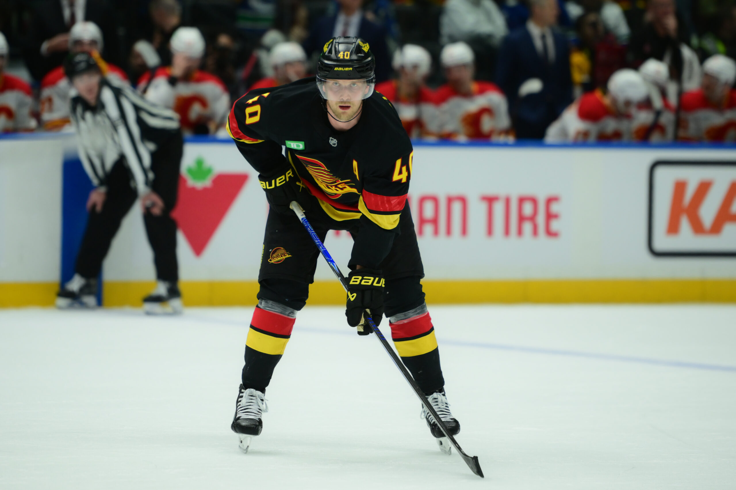 Nov 23, 2025; Vancouver, British Columbia, CAN;  Vancouver Canucks center Elias Pettersson (40) awaits start of play during the third period against the Calgary Flames at Rogers Arena. Mandatory Credit: Simon Fearn-Imagn Images