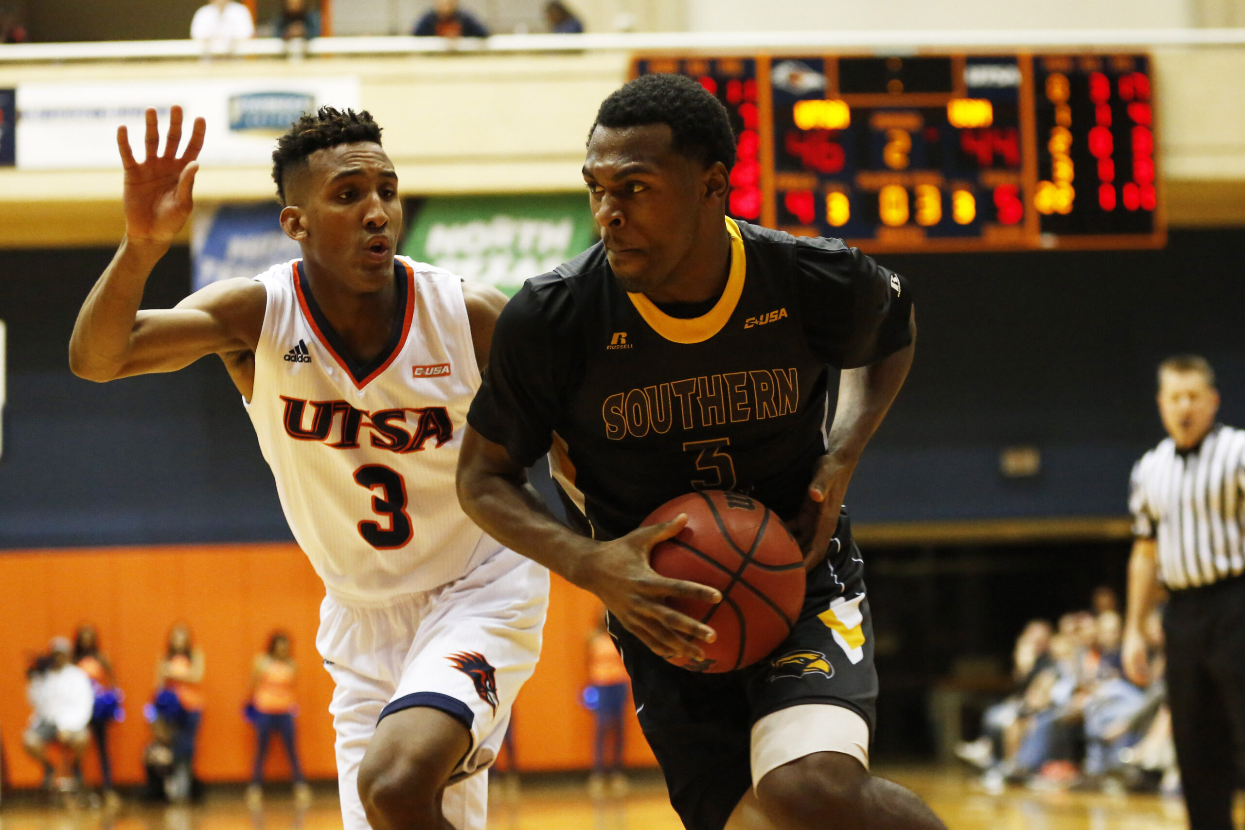Feb 9, 2017; San Antonio, TX, USA; Southern Miss Golden Eagles  guard Robert Thomas III (3) drives to the basket while guarded by UTSA Roadrunners guard Gino Littles (3) during the second half at UTSA Convocation Center. Mandatory Credit: Soobum Im-Imagn Images