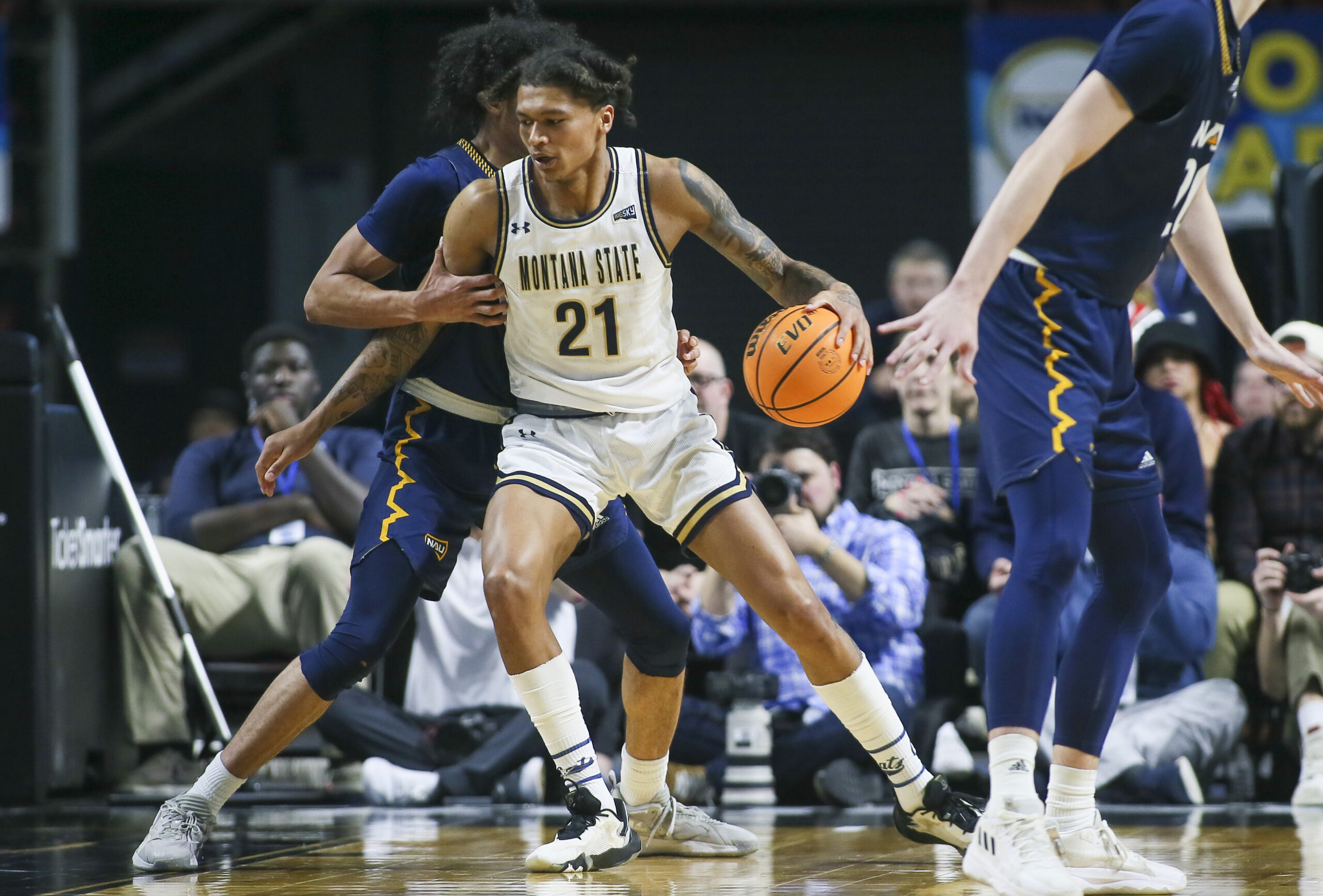 Mar 8, 2023; Boise, ID, USA; Montana State Bobcats guard RaeQuan Battle (21) dribbles during the second half against Northern Arizona Lumberjacks at Idaho Central Arena. Montana State defeated Northern Arizona 85-78. Mandatory Credit: Brian Losness-Imagn Images