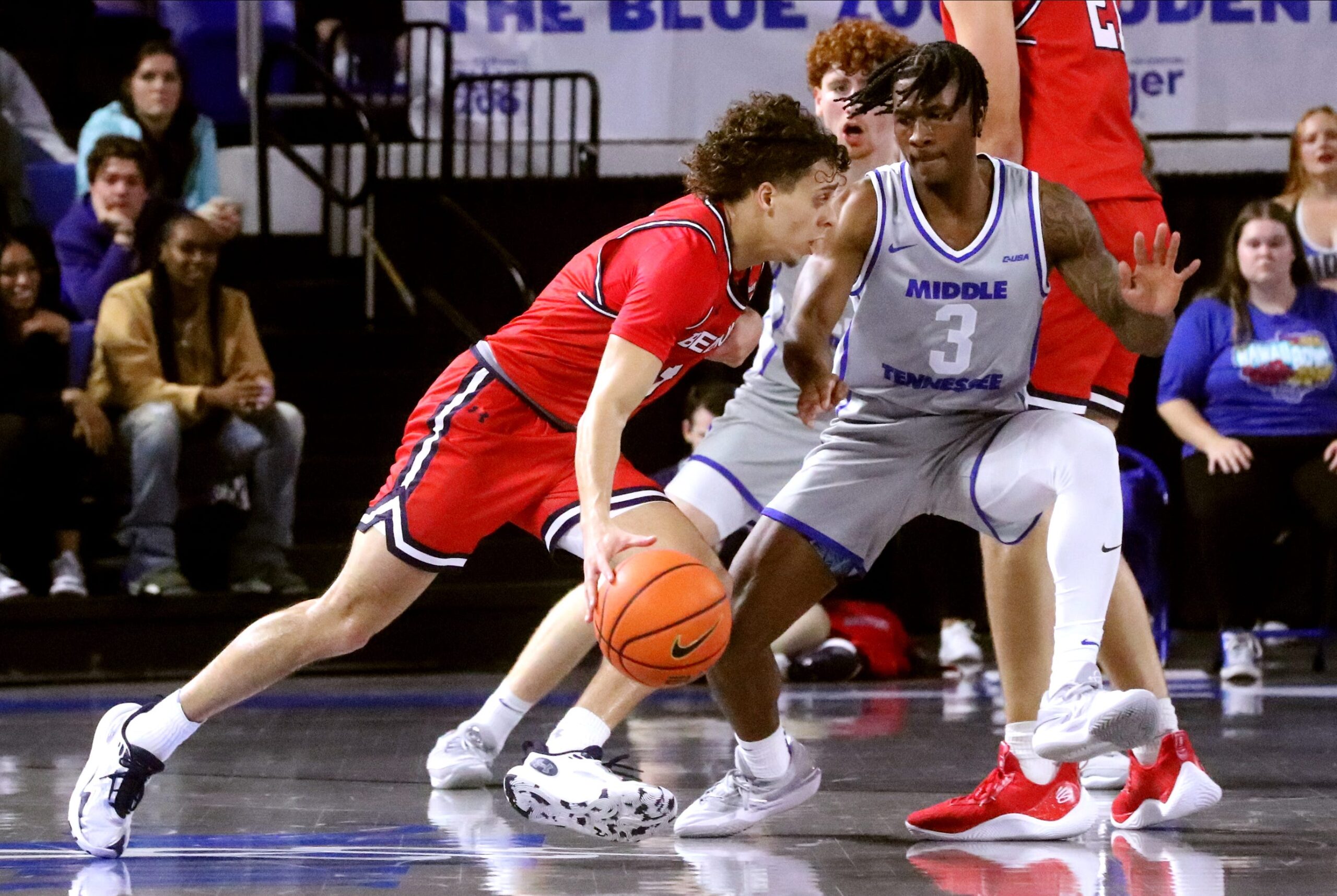 Belmont guard Keishawn Davidson (3) moves the ball around the court as Middle Tennessee guard Jestin Porter (3) guards him during the men   s basketball game on Saturday, Dec. 9, 2023, at MTSU..