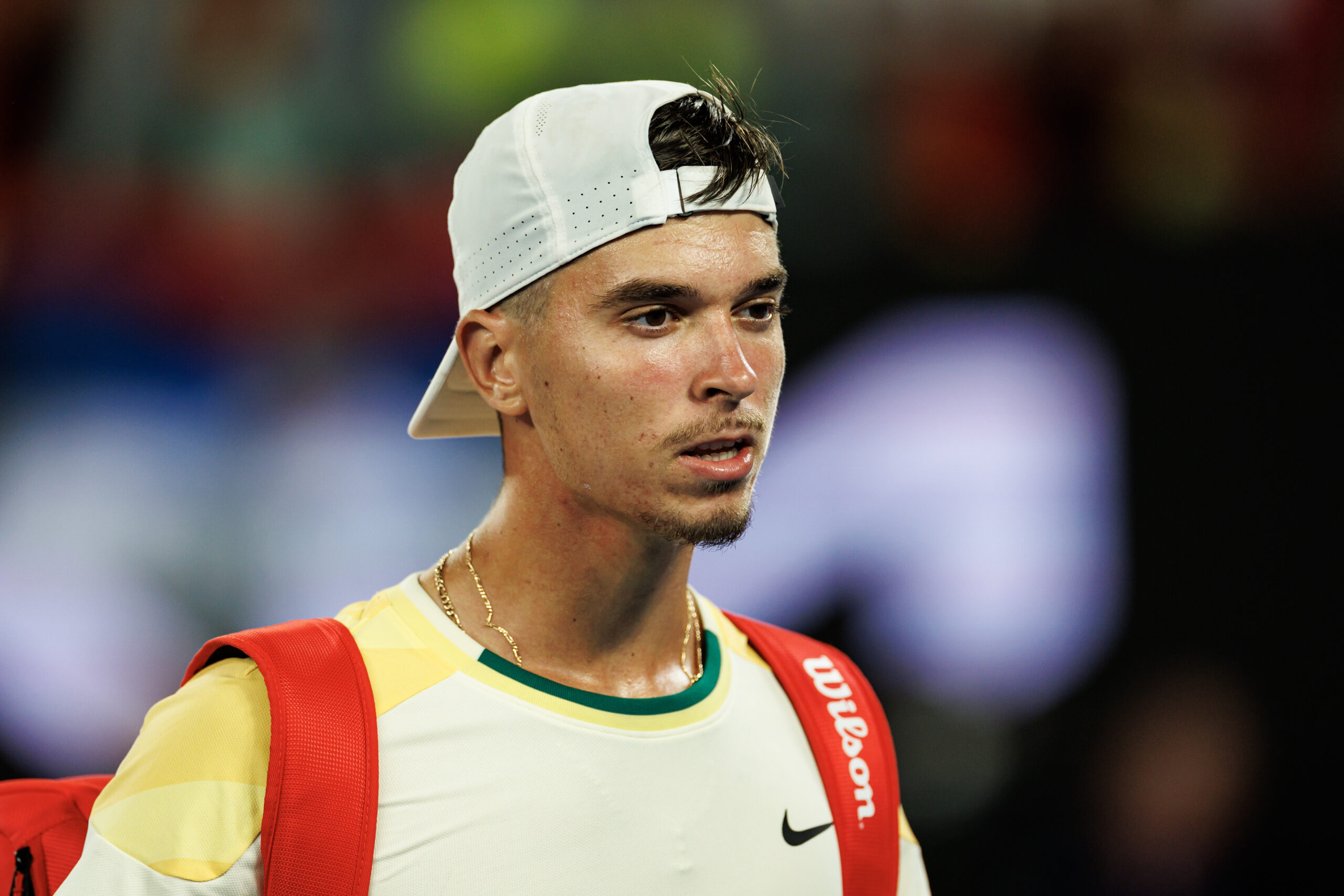 Jan 14, 2024; Melbourne, Victoria, Australia; Dino Prizmic of Croatia leaves Rod Laver Arena after losing to Novak Djokovic of Serbia in the first round of the men s singles. Mandatory Credit: Mike Frey-Imagn Images