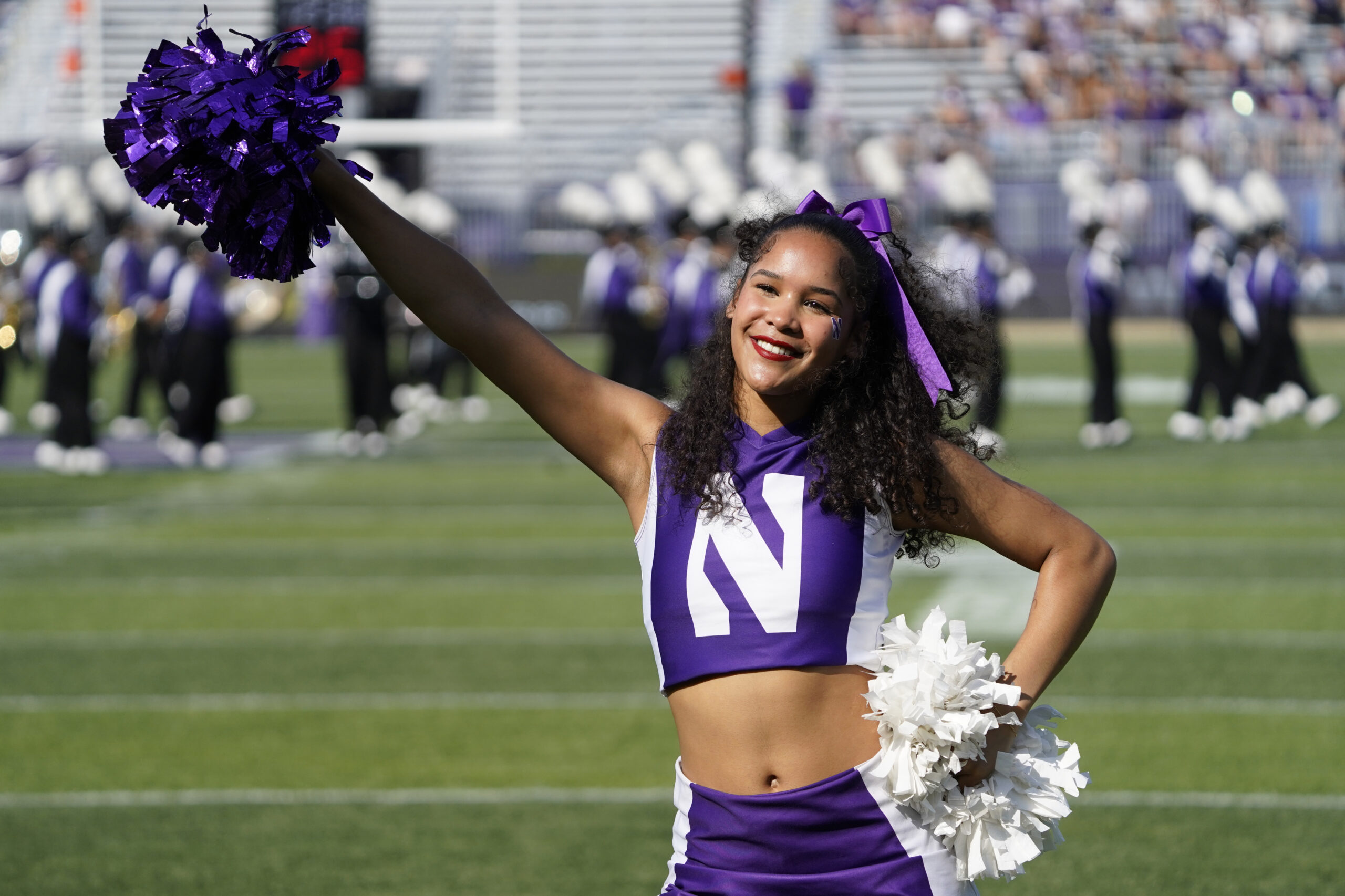 Oct 4, 2025; Evanston, Illinois, USA; Northwestern Wildcats cheerleaders before a game against the ULM Warhawks at Northwestern Medicine Field at Martin Stadium. Mandatory Credit: David Banks-Imagn Images