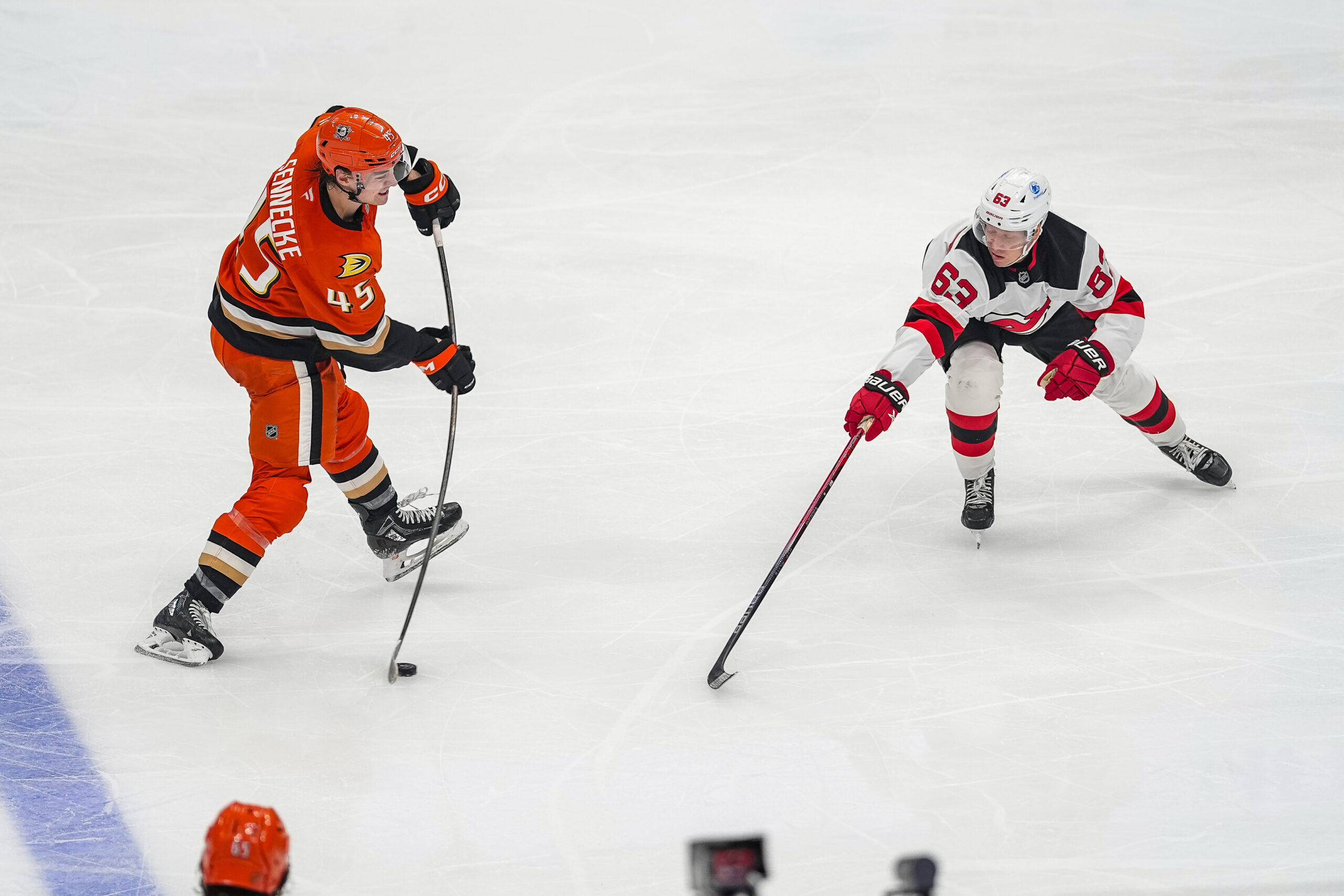 Nov 2, 2025; Anaheim, California, USA; Anaheim Ducks right wing Beckett Sennecke (45)  shoots the puck during the third period at Honda Center. Mandatory Credit: Corinne Votaw-Imagn Images