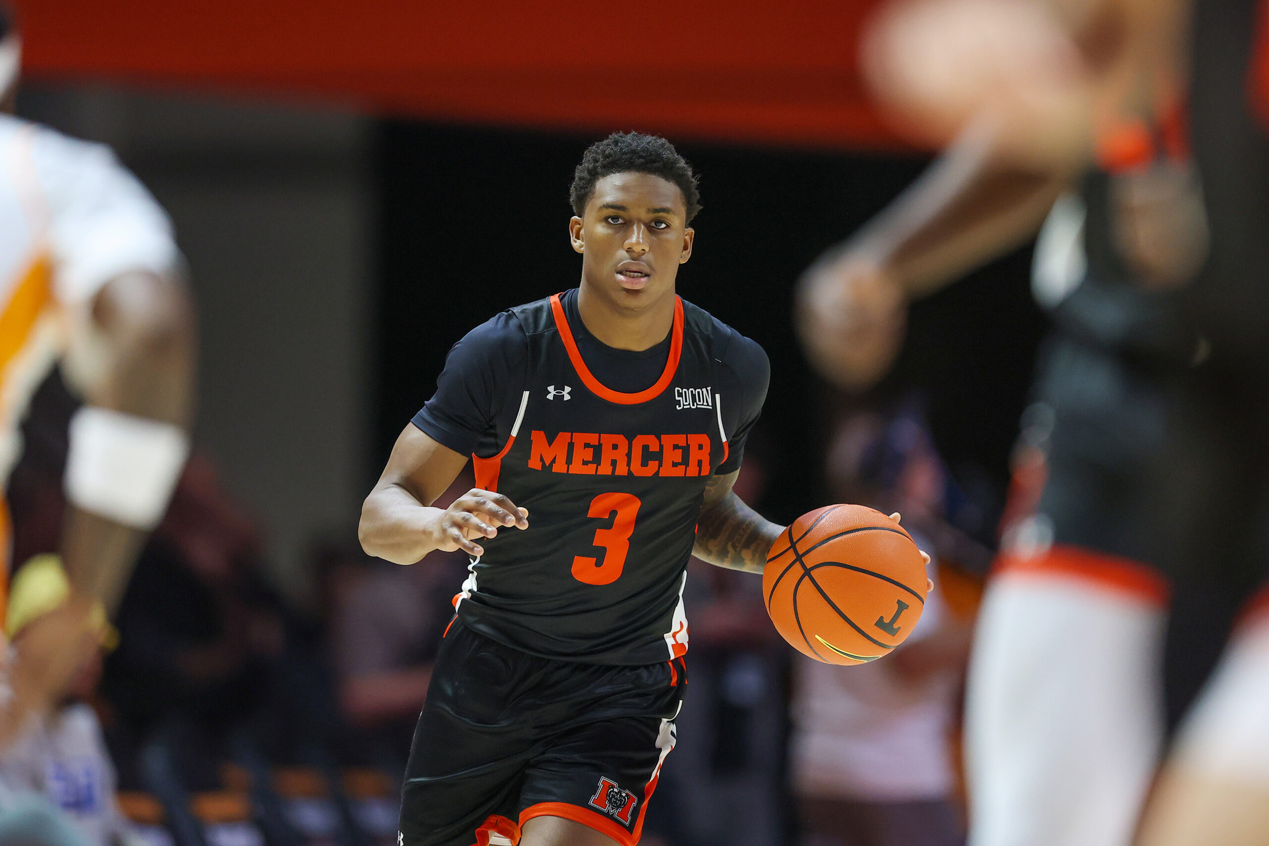 Nov 3, 2025; Knoxville, Tennessee, USA;  Mercer Bears guard Quinton Perkins II (3) brings the ball up court against the Tennessee Volunteers during the second half at Thompson-Boling Arena at Food City Center. Mandatory Credit: Randy Sartin-Imagn Images