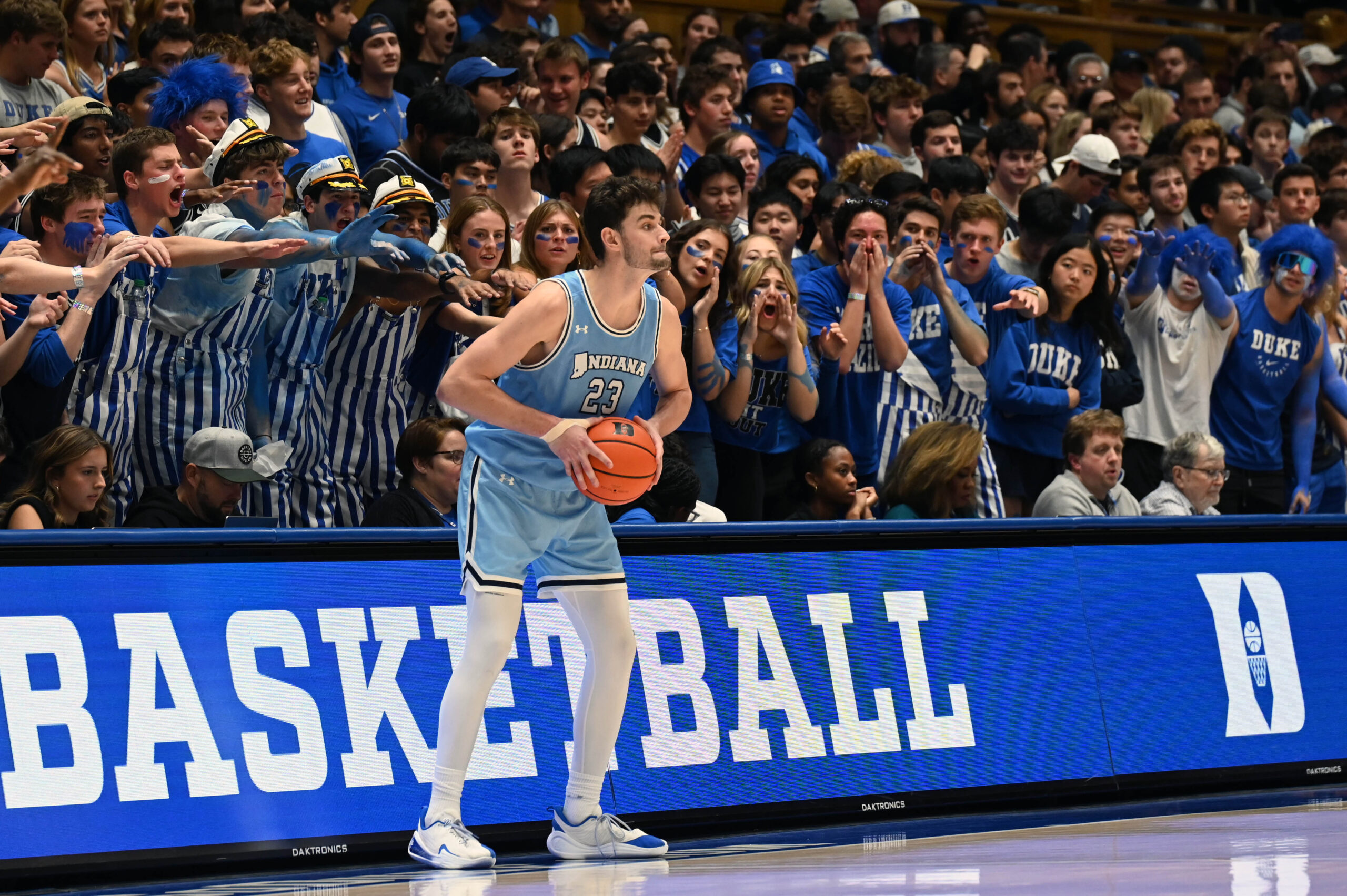 Nov 14, 2025; Durham, North Carolina, USA;  Indiana State Sycamores forward Ian Scott (23) is harassed by Duke Blue Devils fans while trying to inbound the ball during the second half at Cameron Indoor Stadium. Mandatory Credit: Rob Kinnan-Imagn Images