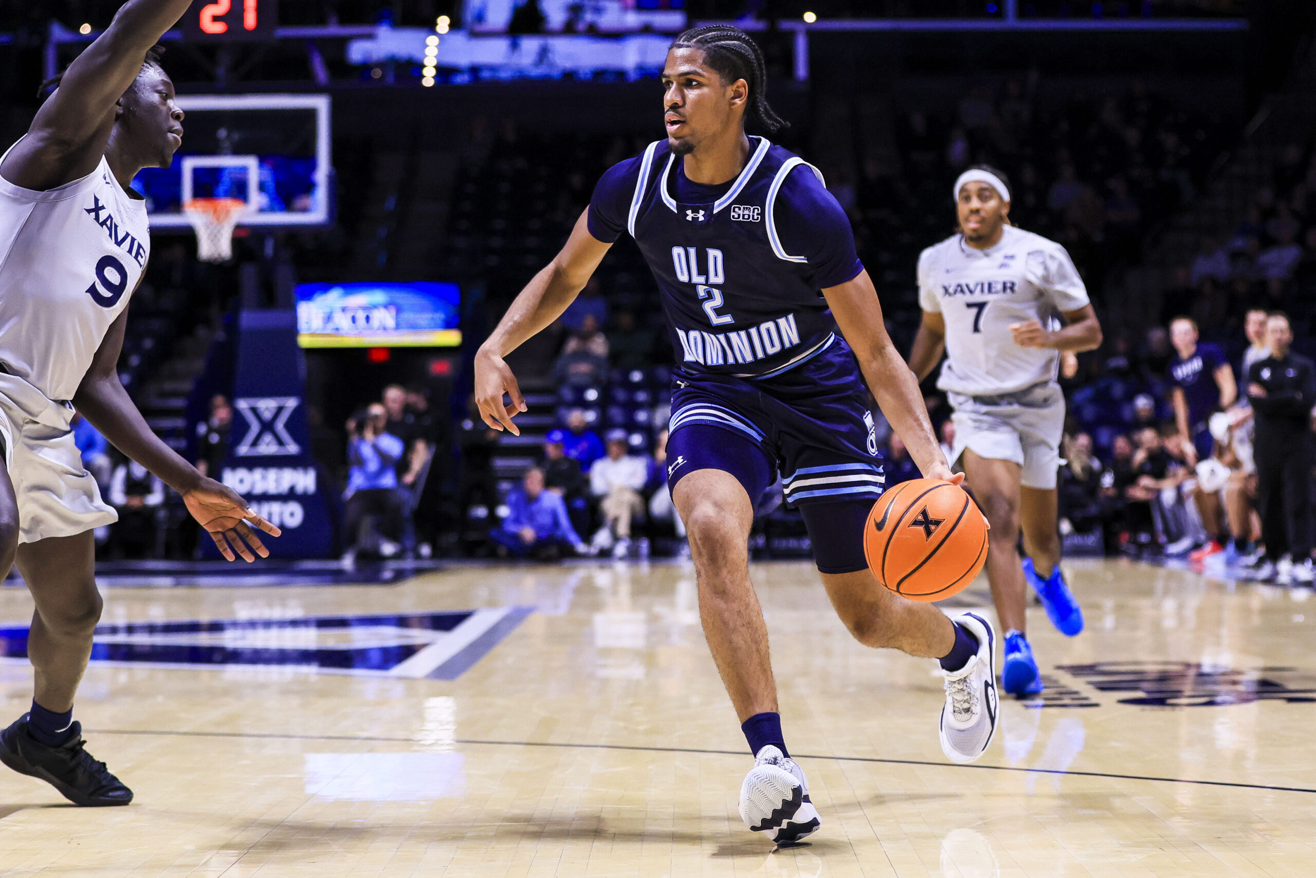 Nov 18, 2025; Cincinnati, Ohio, USA; Old Dominion Monarchs guard Zacch Wiggins (2) dribbles against Xavier Musketeers guard Mier Panoam (9) in the second half at Cintas Center. Mandatory Credit: Katie Stratman-Imagn Images