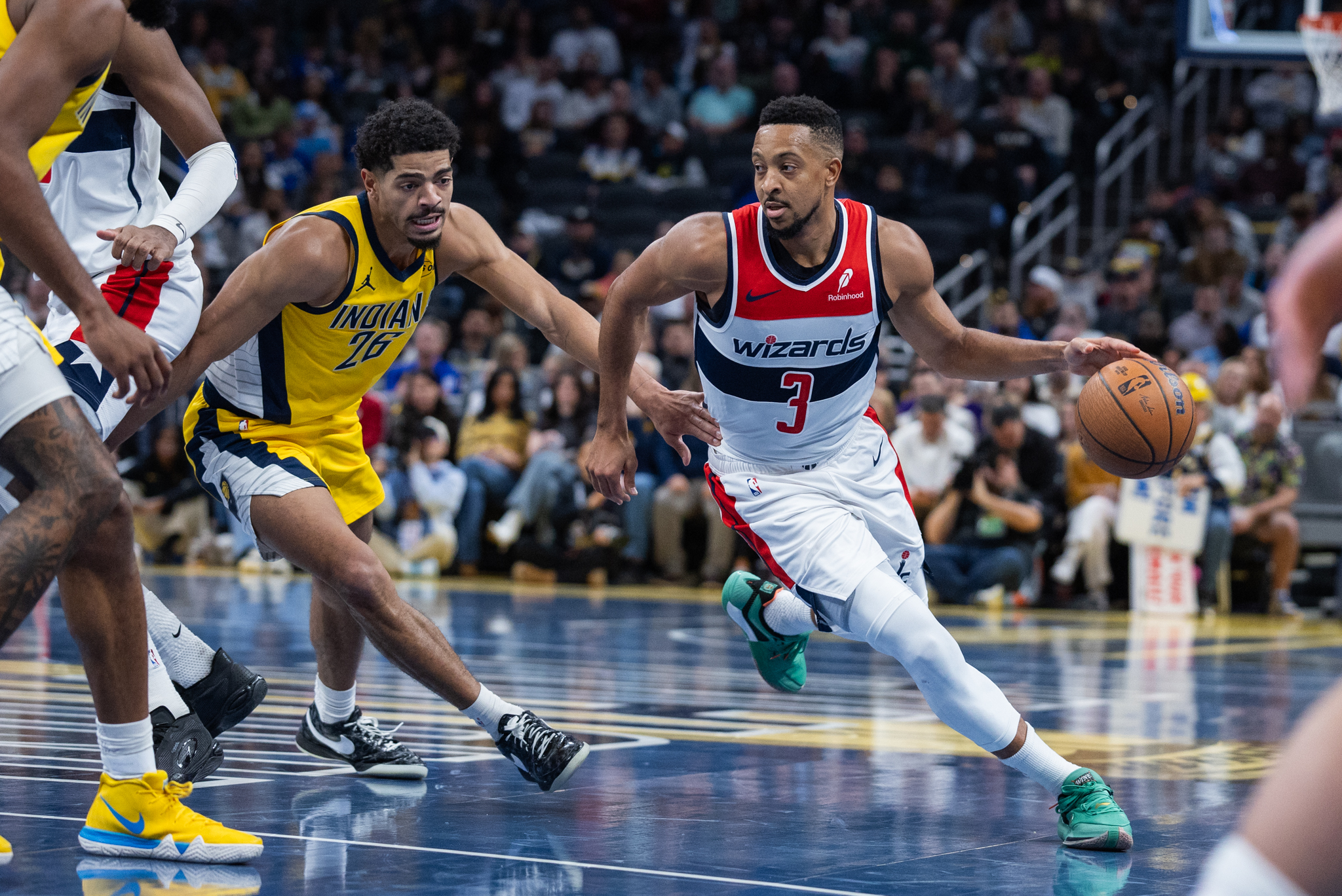 Nov 28, 2025; Indianapolis, Indiana, USA;  Washington Wizards guard CJ McCollum (3) dribbles the ball while Indiana Pacers guard Ben Sheppard (26) defends in the second half at Gainbridge Fieldhouse. Mandatory Credit: Trevor Ruszkowski-Imagn Images
