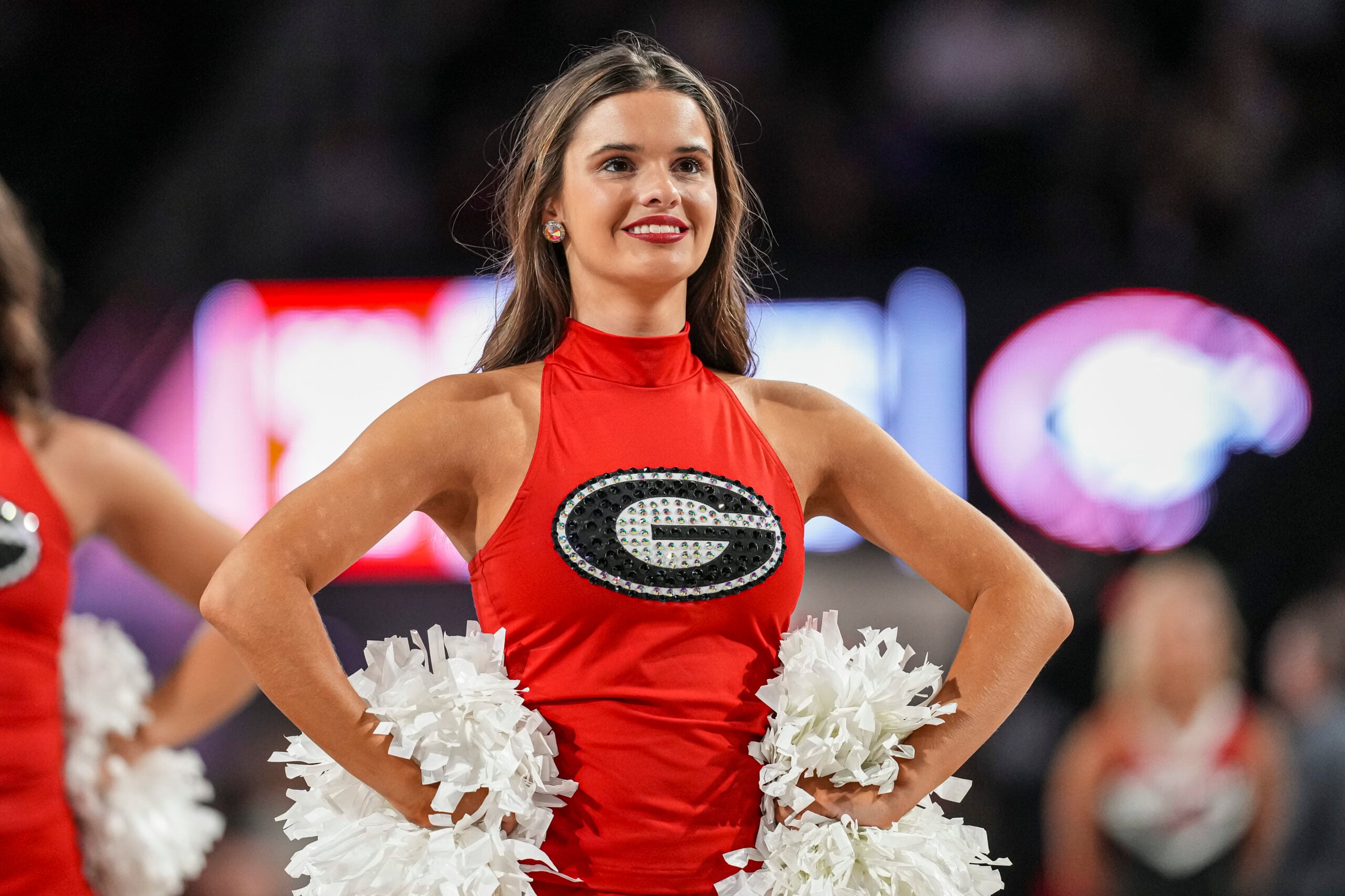 Nov 29, 2025; Athens, Georgia, USA; Georgia Bulldogs cheerleaders and dance squad members shown on the court during the game against the Tennessee Tech Golden Eagles at Stegeman Coliseum. Mandatory Credit: Dale Zanine-Imagn Images