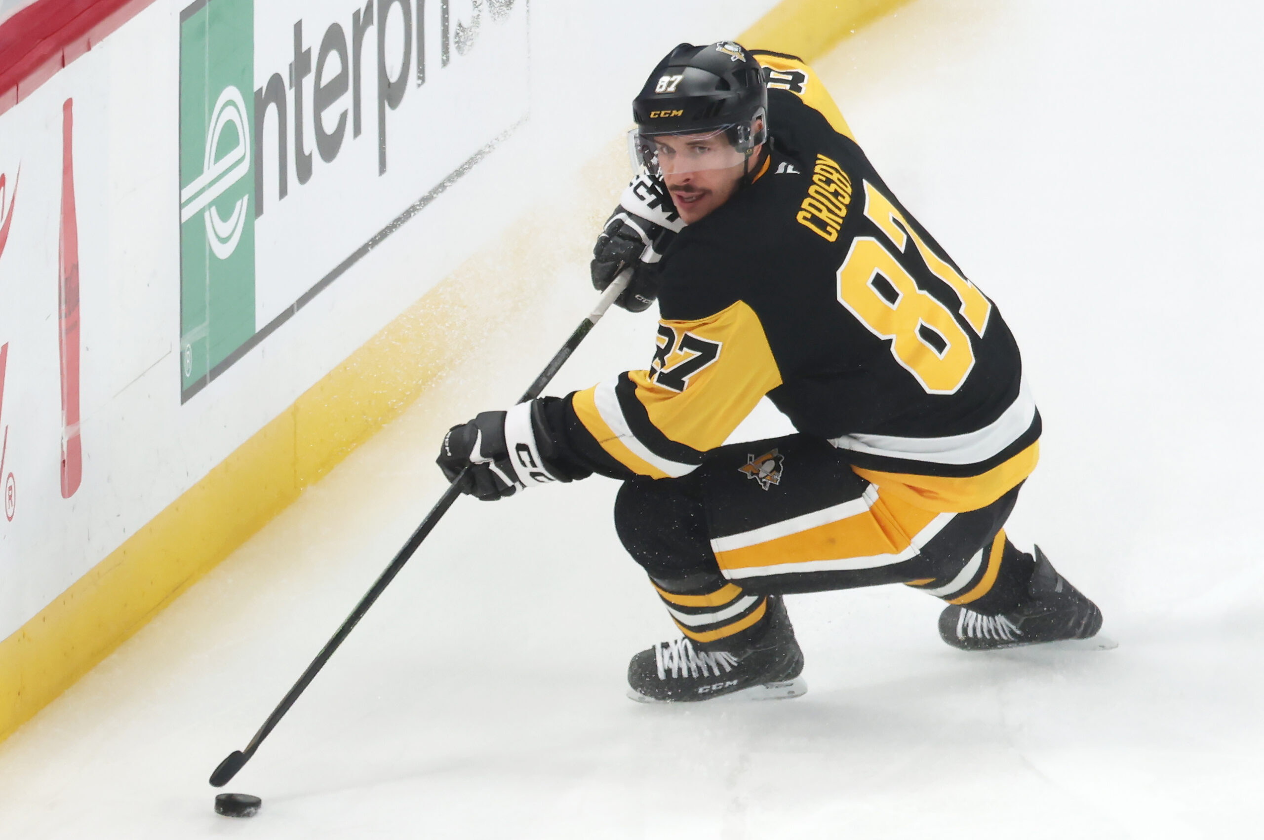 Nov 29, 2025; Pittsburgh, Pennsylvania, USA;  Pittsburgh Penguins center Sidney Crosby (87) handles the puck against the Toronto Maple Leafs during the third period at PPG Paints Arena. Mandatory Credit: Charles LeClaire-Imagn Images