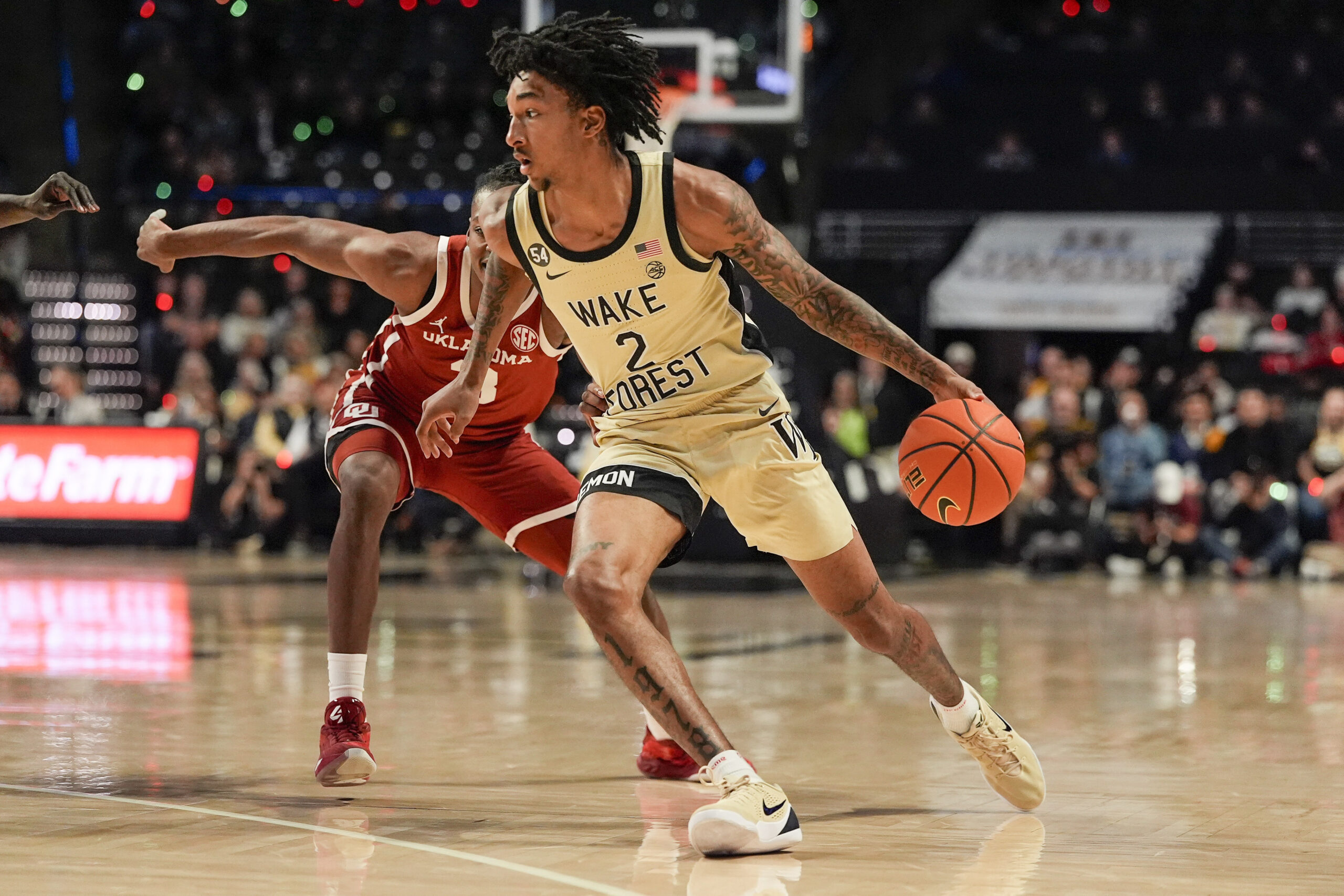 Dec 2, 2025; Winston-Salem, North Carolina, USA; Wake Forest Demon Deacons guard Juke Harris (2) goes to the basket against the Oklahoma Sooners during the first half at Lawrence Joel Veterans Memorial Coliseum. Mandatory Credit: Jim Dedmon-Imagn Images