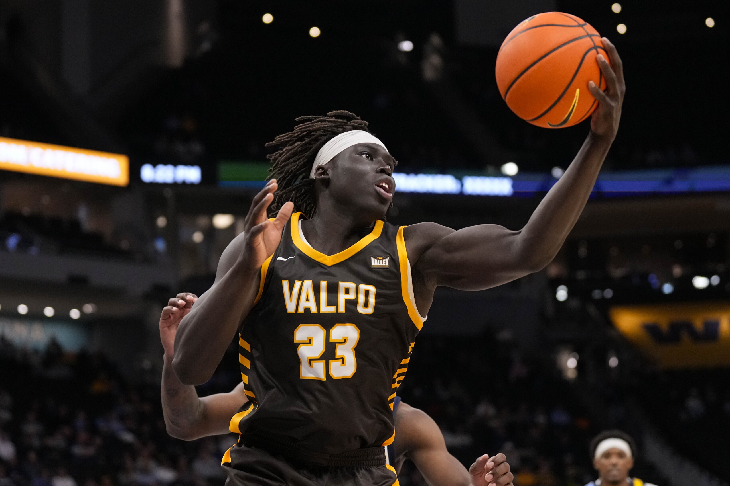 Dec 2, 2025; Milwaukee, Wisconsin, USA;  Valparaiso Beacons center Shon Tupuola (23) reaches for a rebound during the second half against the Marquette Golden Eagles at Fiserv Forum. Mandatory Credit: Jeff Hanisch-Imagn Images
