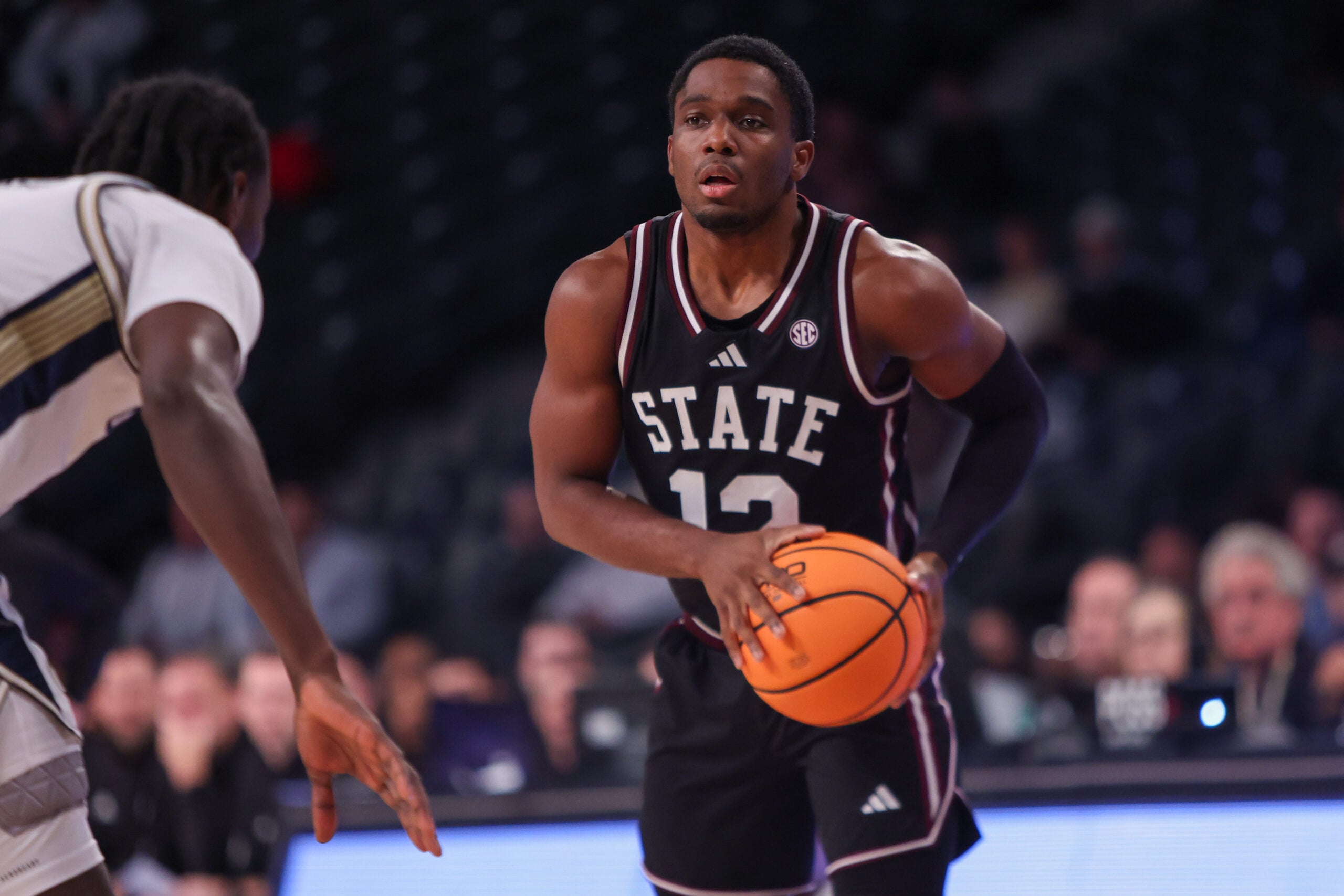 Dec 3, 2025; Atlanta, Georgia, USA; Mississippi State Bulldogs guard Josh Hubbard (12) dribbles against the Georgia Tech Yellow Jackets in the first half at McCamish Pavilion. Mandatory Credit: Brett Davis-Imagn Images