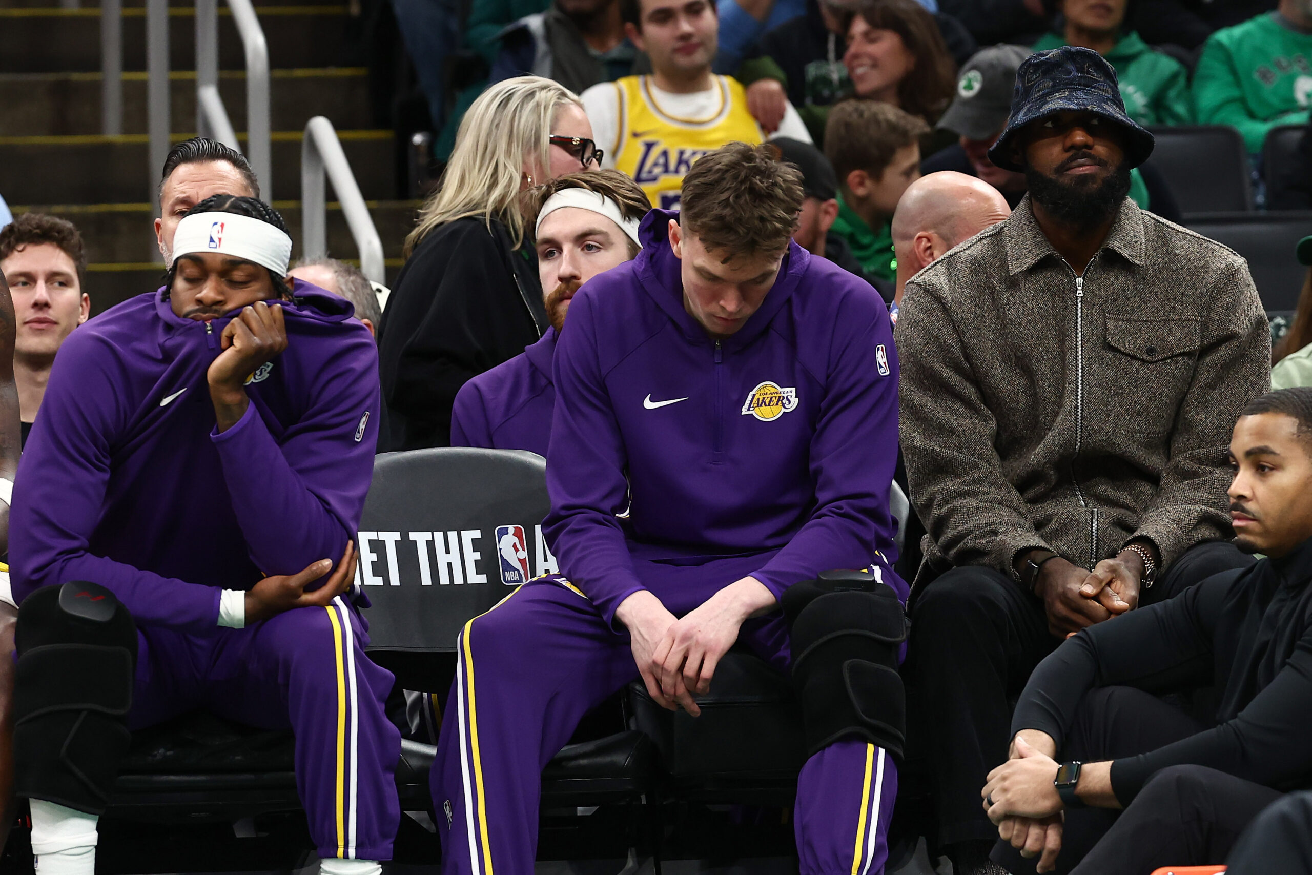 Dec 5, 2025; Boston, Massachusetts, USA; Los Angeles Lakers forward Lebron James (23) sits on the bench in street clothes during the first half against the Boston Celtics at TD Garden. Mandatory Credit: Winslow Townson-Imagn Images