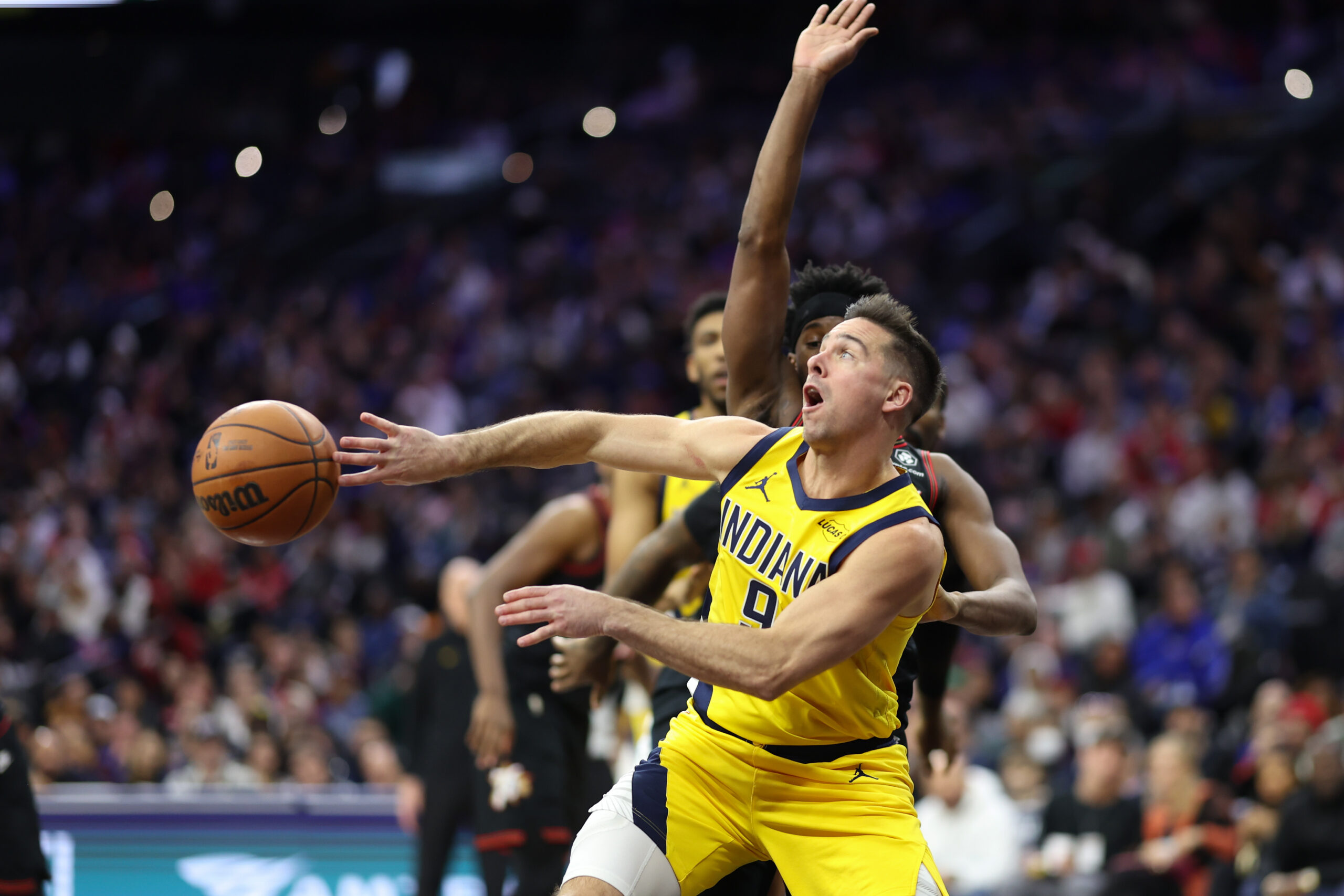 Dec 12, 2025; Philadelphia, Pennsylvania, USA; Indiana Pacers guard T.J. McConnell (9) passes the ball against the Philadelphia 76ers during the third quarter at Xfinity Mobile Arena. Mandatory Credit: Bill Streicher-Imagn Images
