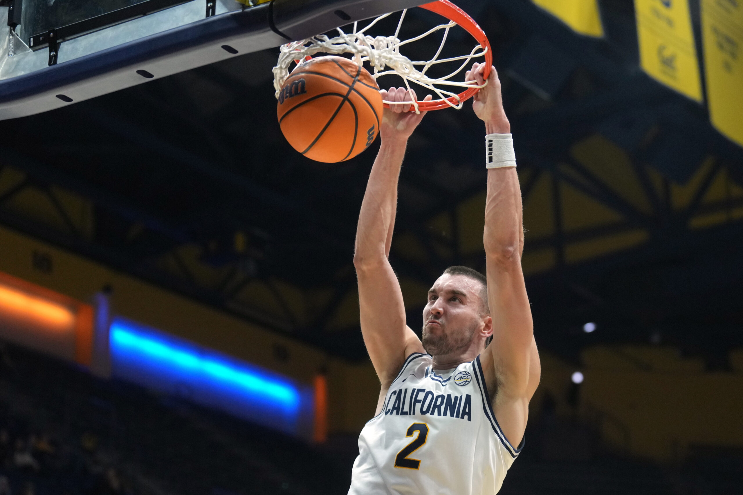 Dec 13, 2025; Berkeley, California, USA; California Golden Bears forward John Camden (2) dunks against the Northwestern State Demons during the second half at Haas Pavilion. Mandatory Credit: Darren Yamashita-Imagn Images