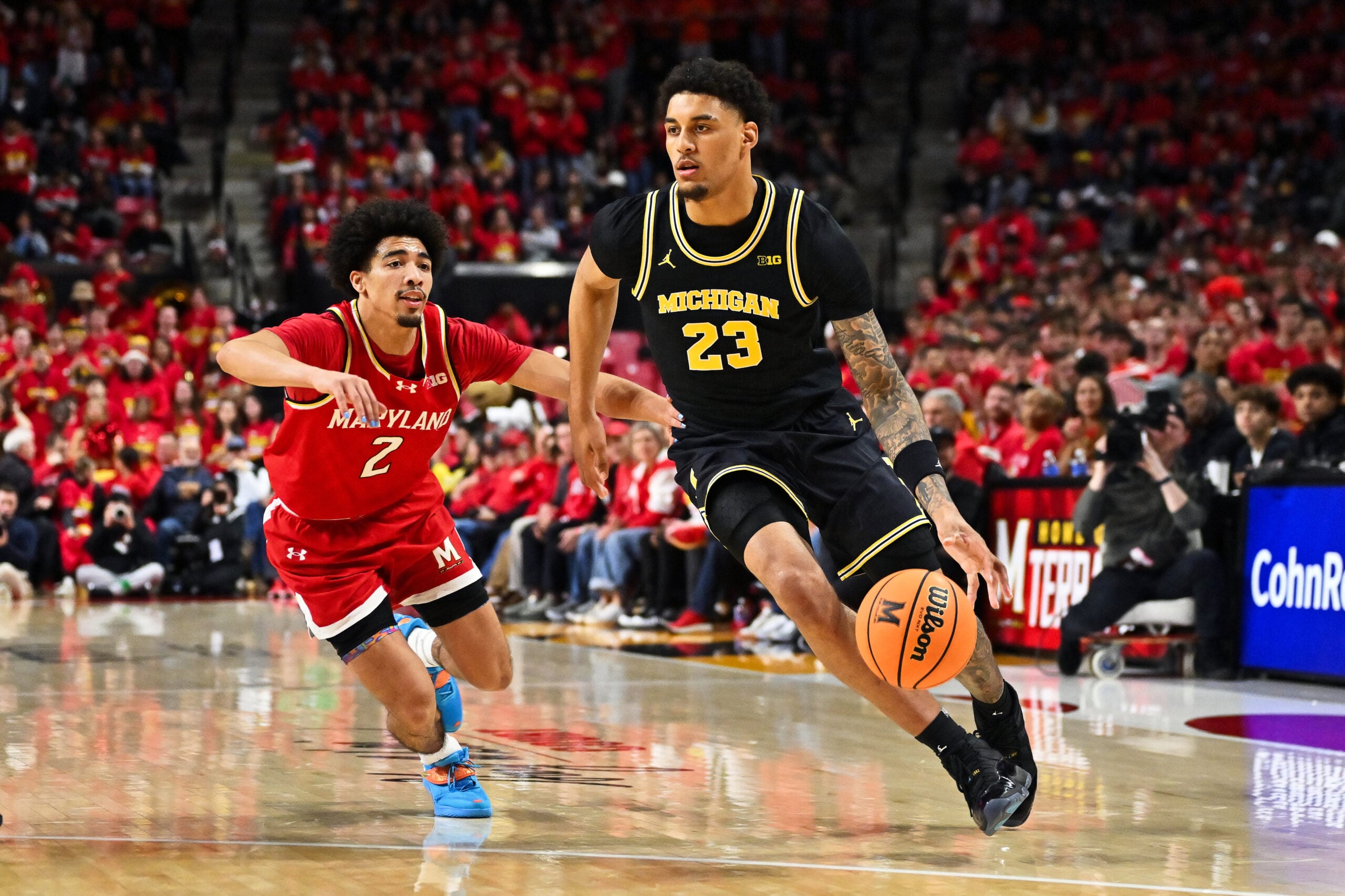 Dec 13, 2025; College Park, Maryland, USA;  Michigan Wolverines forward Yaxel Lendeborg (23) controls the ball against the Maryland Terrapins at Xfinity Center. Mandatory Credit: Jamie Sabau-Imagn Images