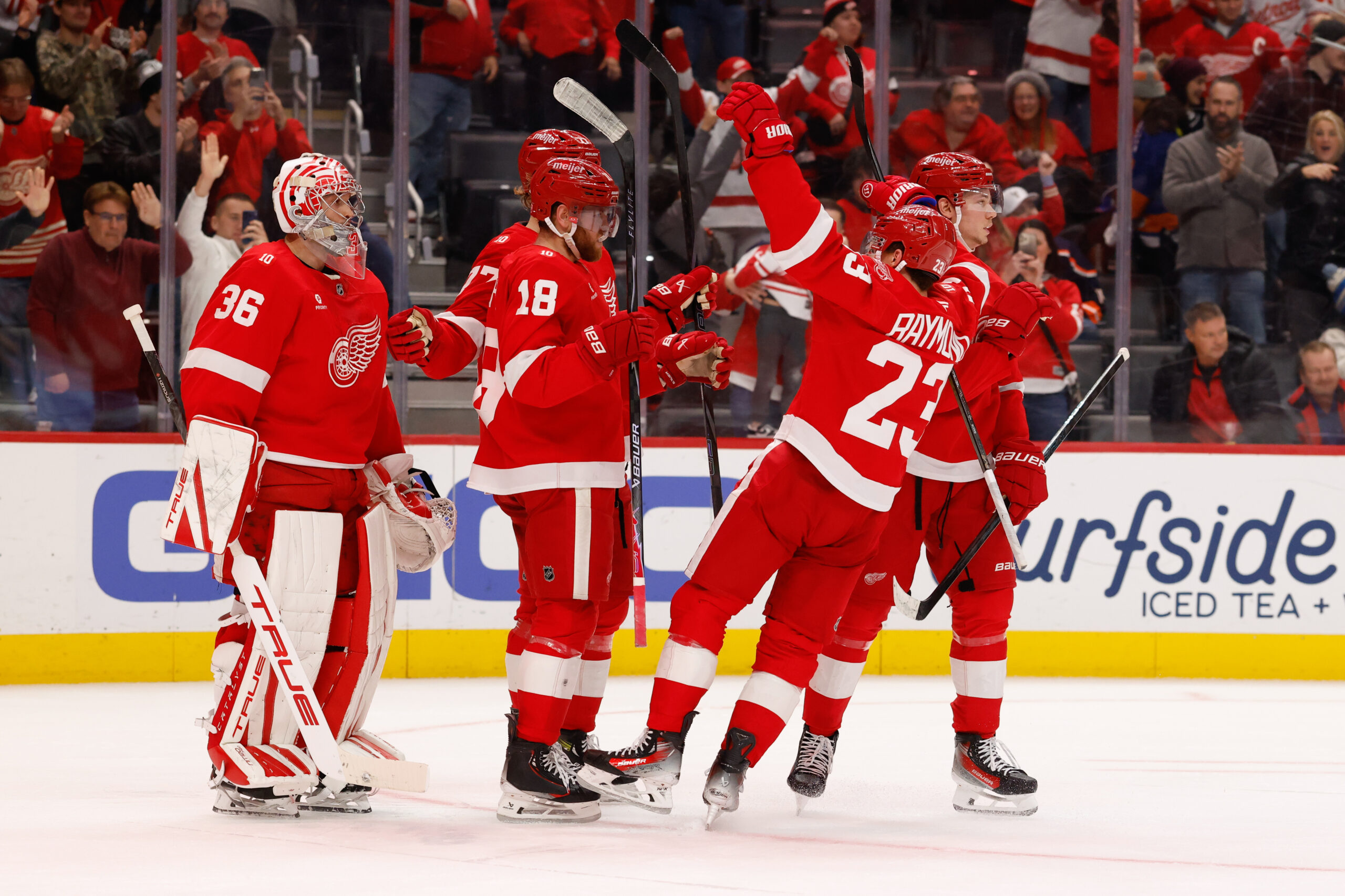 Dec 16, 2025; Detroit, Michigan, USA;  Detroit Red Wings right wing Alex Debrincat (93) celebrates after defeating the New York Islanders at Little Caesars Arena. Mandatory Credit: Rick Osentoski-Imagn Images