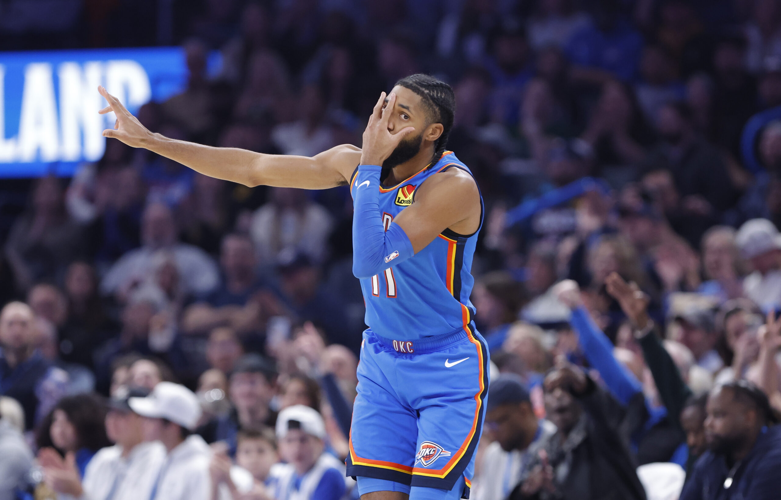 Dec 18, 2025; Oklahoma City, Oklahoma, USA; Oklahoma City Thunder guard Isaiah Joe (11) gestures after scoring against the Los Angeles Clippers during the second half at Paycom Center. Mandatory Credit: Alonzo Adams-Imagn Images