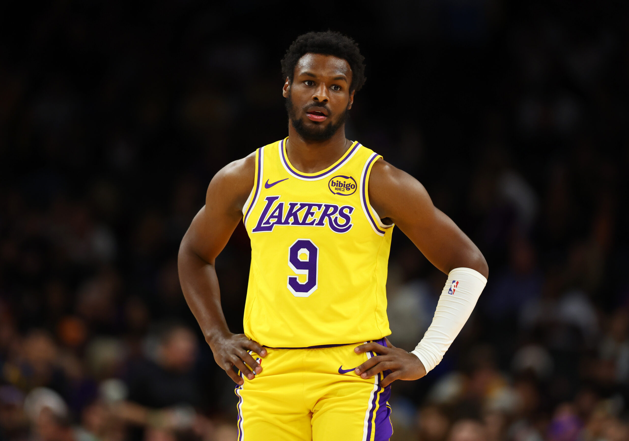 Dec 23, 2025; Phoenix, Arizona, USA; Los Angeles Lakers guard Bronny James (9) against the Phoenix Suns in the second half at Mortgage Matchup Center. Mandatory Credit: Mark J. Rebilas-Imagn Images