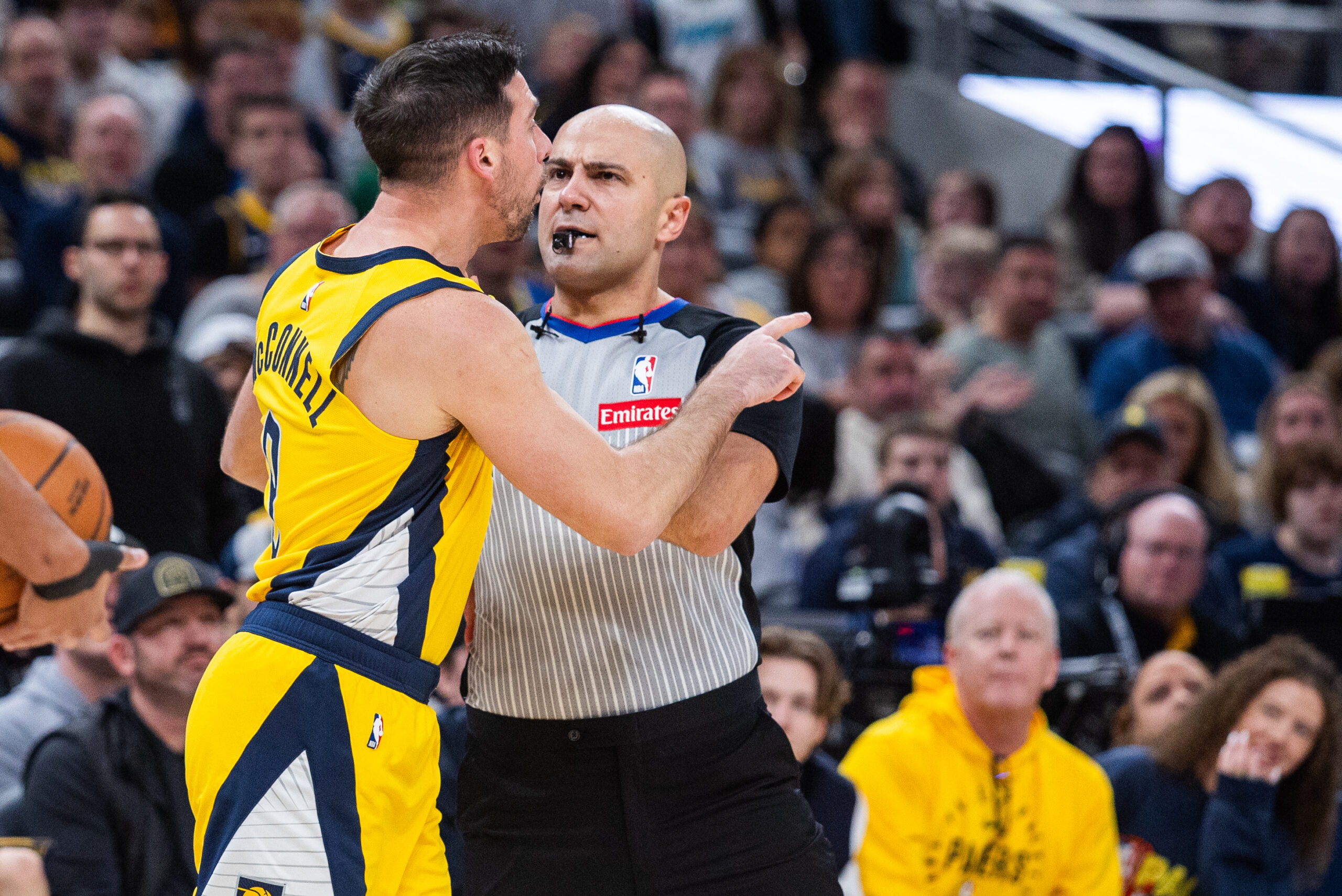 Dec 26, 2025; Indianapolis, Indiana, USA; Indiana Pacers guard T.J. McConnell (9) gets into an altercation with Boston Celtics guard Jordan Walsh (27)  in the second half at Gainbridge Fieldhouse. Mandatory Credit: Trevor Ruszkowski-Imagn Images
