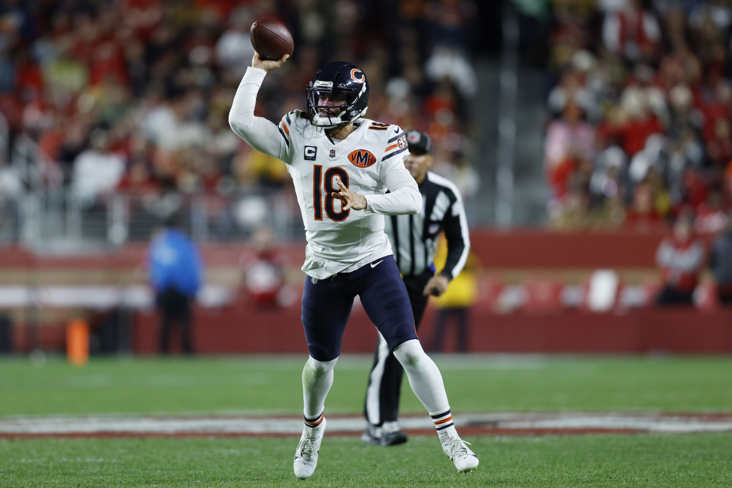 Dec 28, 2025; Santa Clara, California, USA; Chicago Bears quarterback Caleb Williams (18) throws a pass against the San Francisco 49ers in the second half at Levi's Stadium. Mandatory Credit: Sergio Estrada-Imagn Images