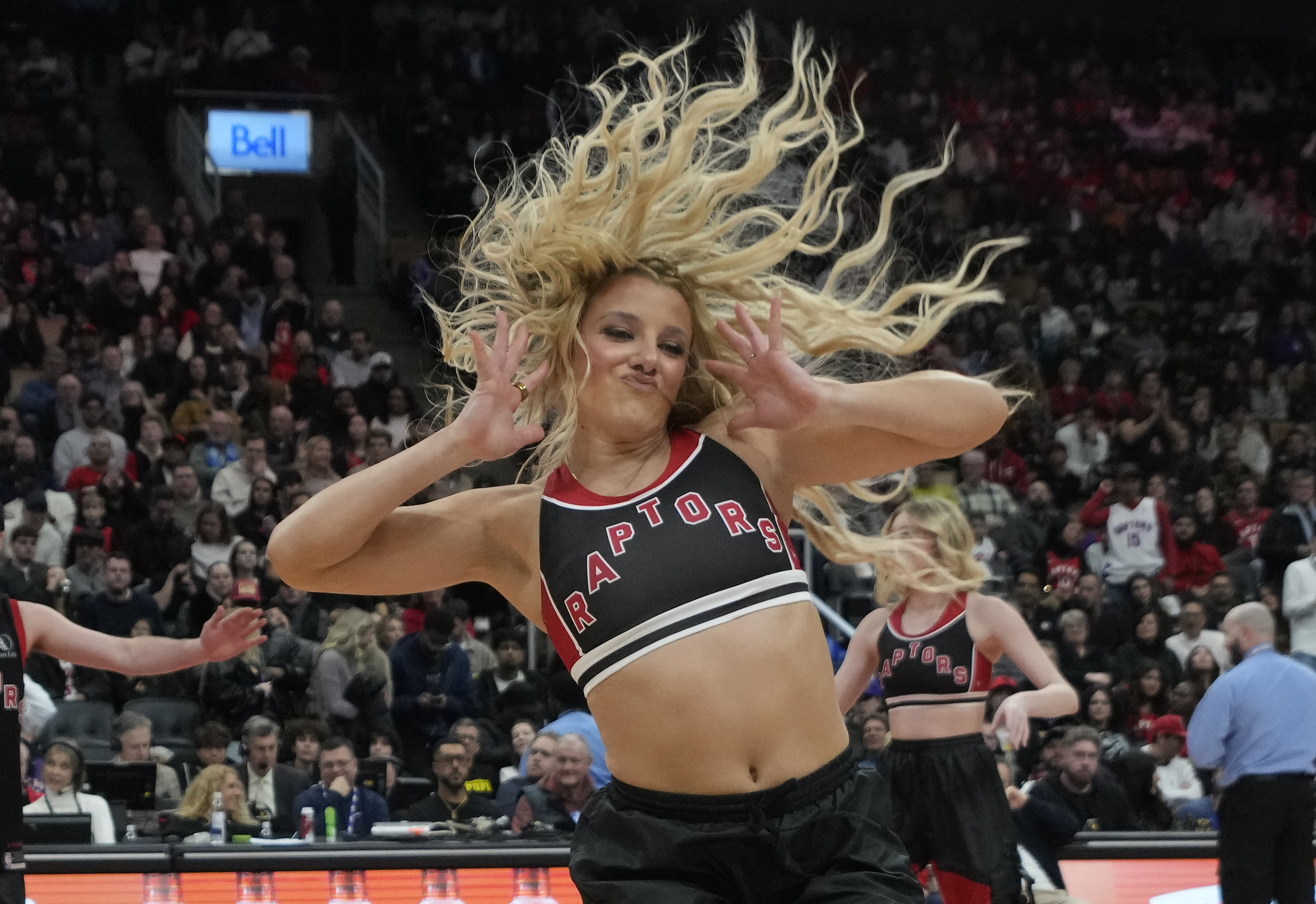 Dec 29, 2025; Toronto, Ontario, CAN;  A member of the  Toronto Raptors dance team performs during a break in the action against the Orlando Magic at Scotiabank Arena. Mandatory Credit: John E. Sokolowski-Imagn Images