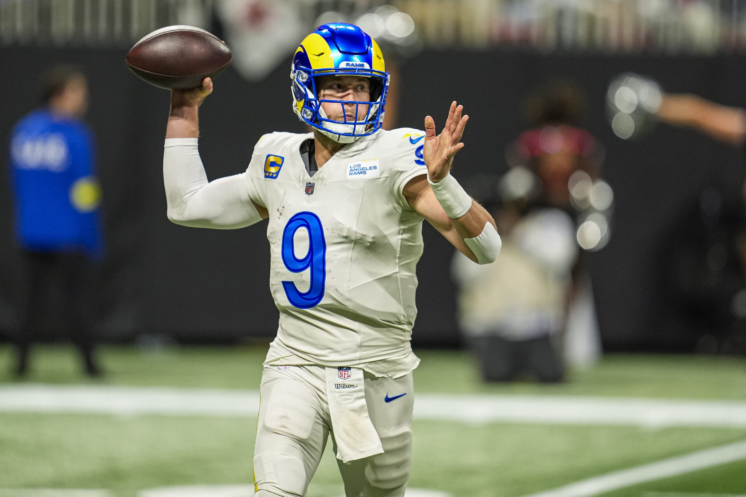 Dec 29, 2025; Atlanta, Georgia, USA; Los Angeles Rams quarterback Matthew Stafford (9) passes against the Atlanta Falcons during the second half at Mercedes-Benz Stadium. Mandatory Credit: Dale Zanine-Imagn Images