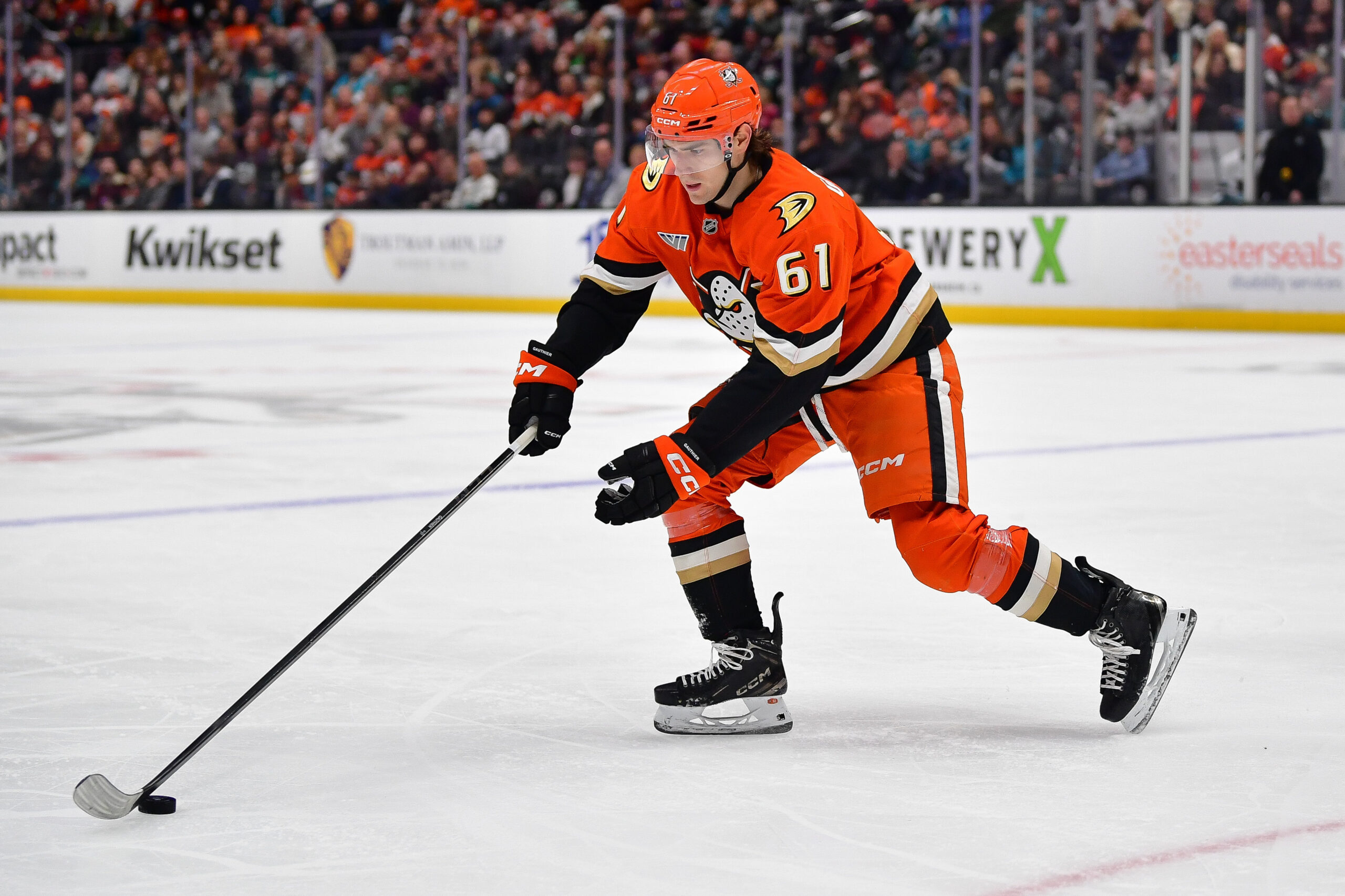 Dec 29, 2025; Anaheim, California, USA; Anaheim Ducks left wing Cutter Gauthier (61) controls the puck against the San Jose Sharks during the second period at Honda Center. Mandatory Credit: Gary A. Vasquez-Imagn Images